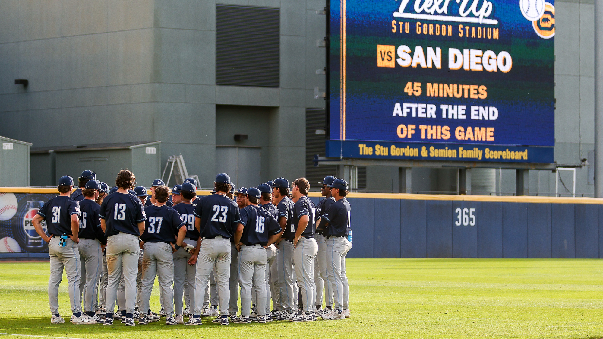 usd baseball team huddle at cal 3_7_26 - credit scott marshall