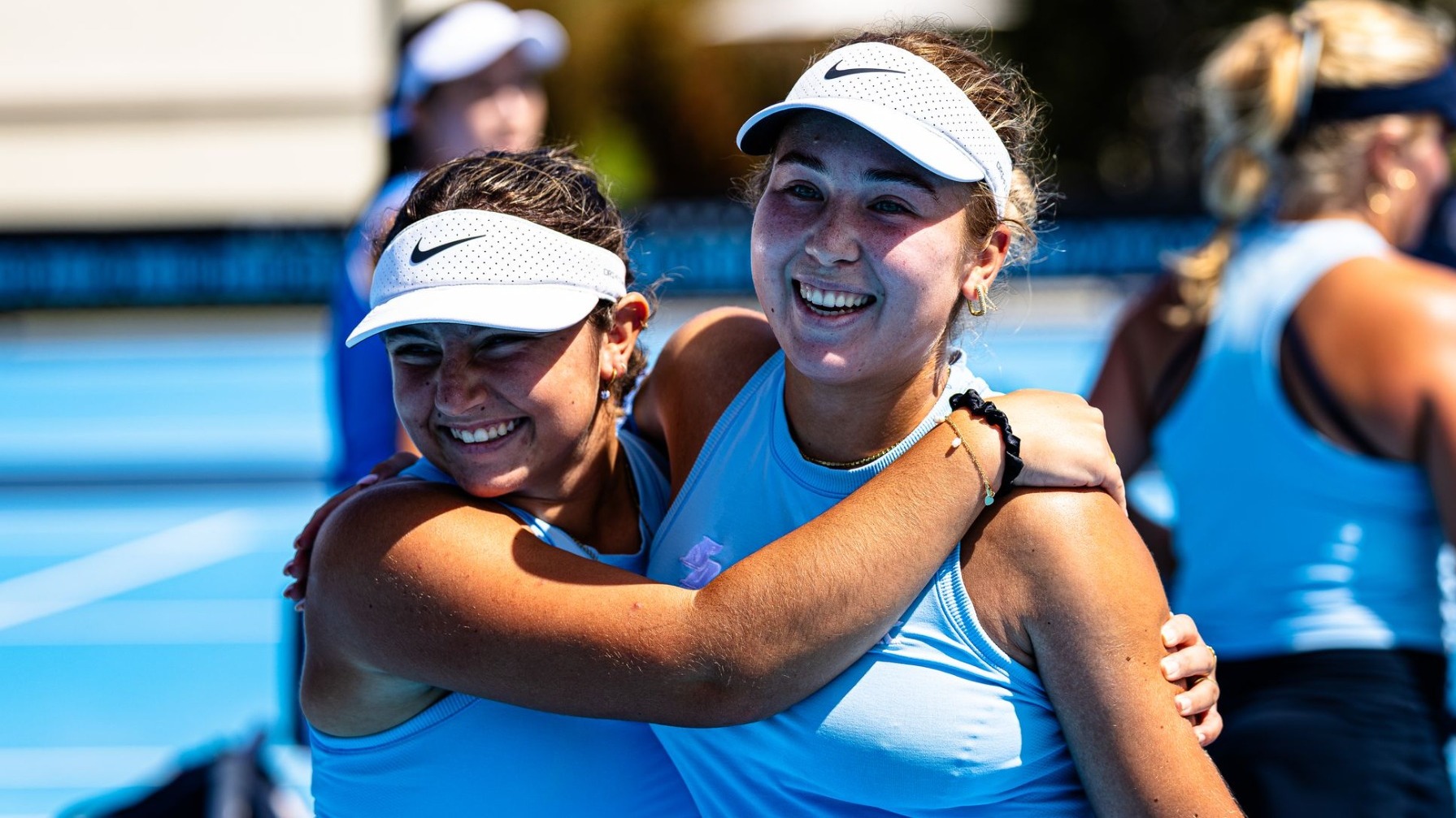 Maria Shmakova and Gabby Gregg Hug
