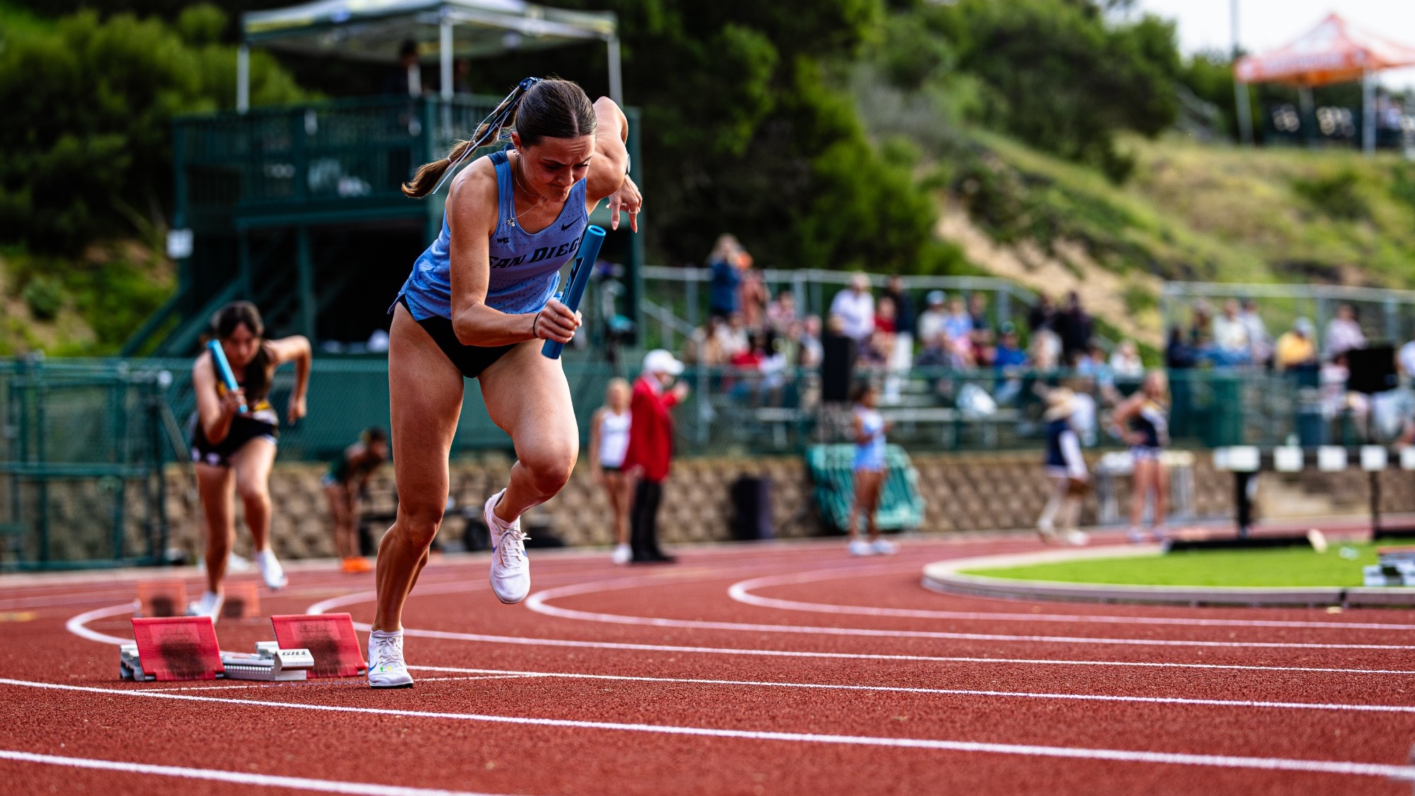 Lilly Dow out of sprinting blocks at Point Loma