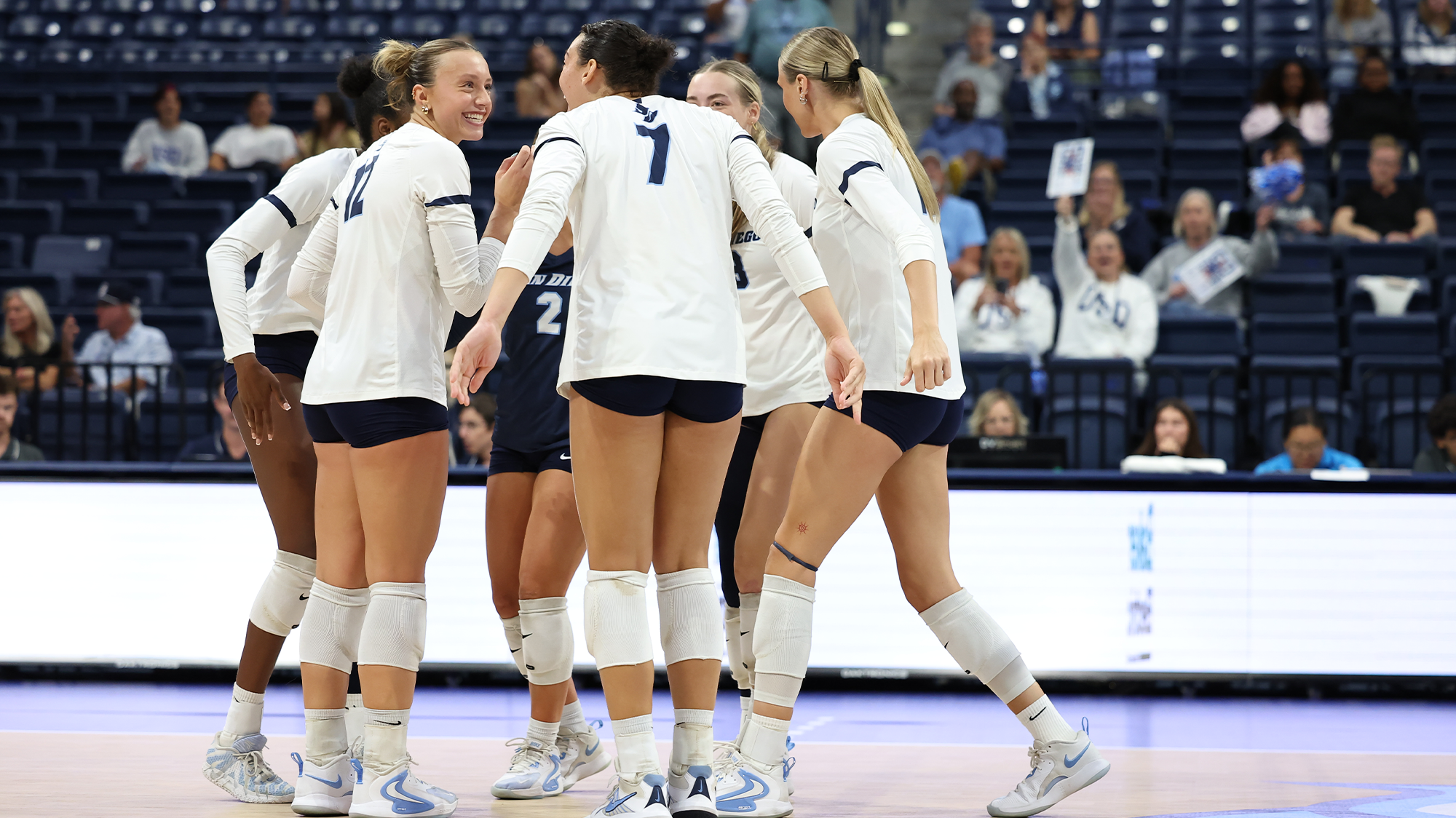 usd volleyball celebrates vs. arizona 9-17-26 - credit thomas christensen