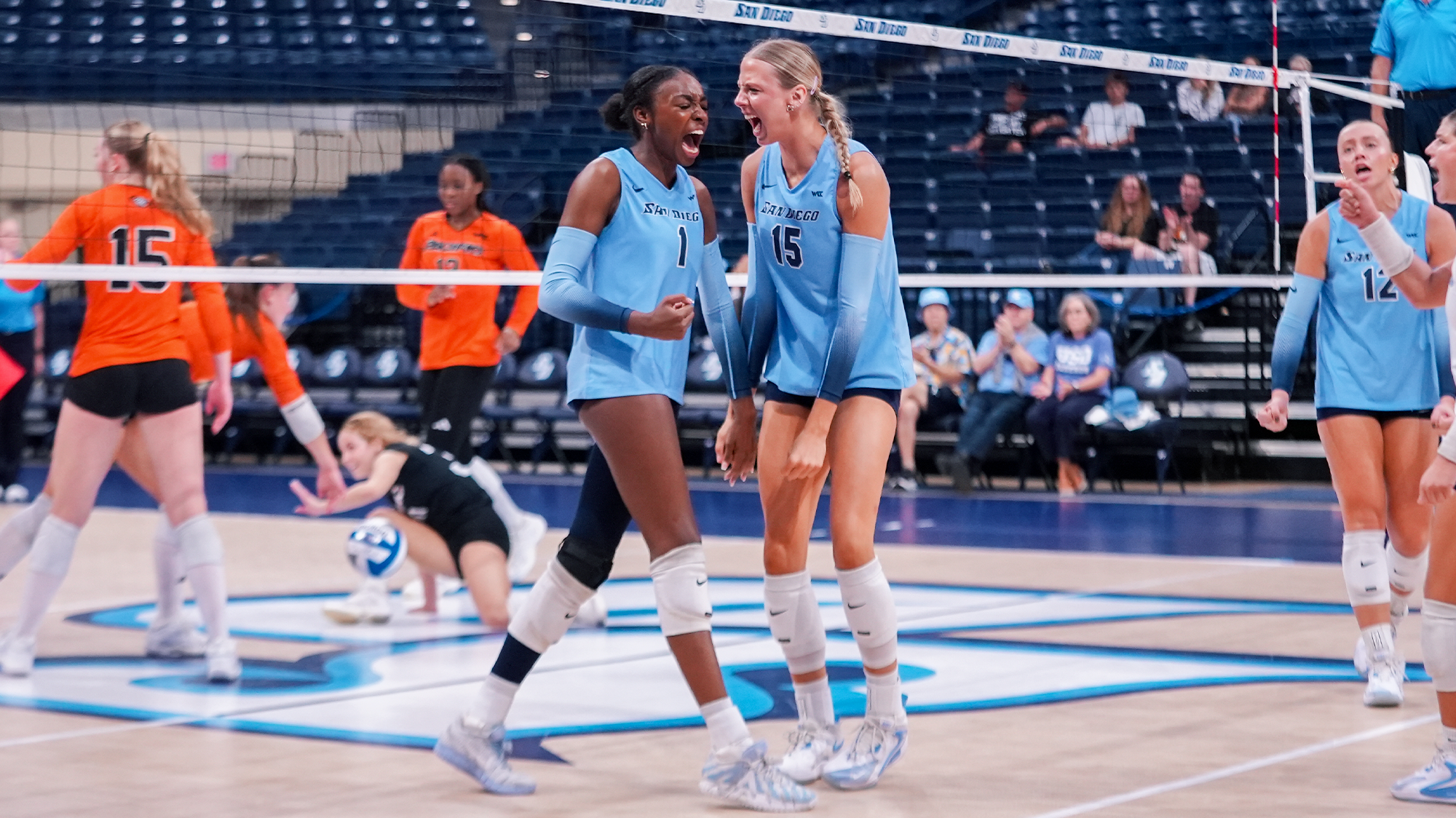 nemo beach and meghan scholz celebrate in win over pacific - 9/26/26 - credit anderson haigler