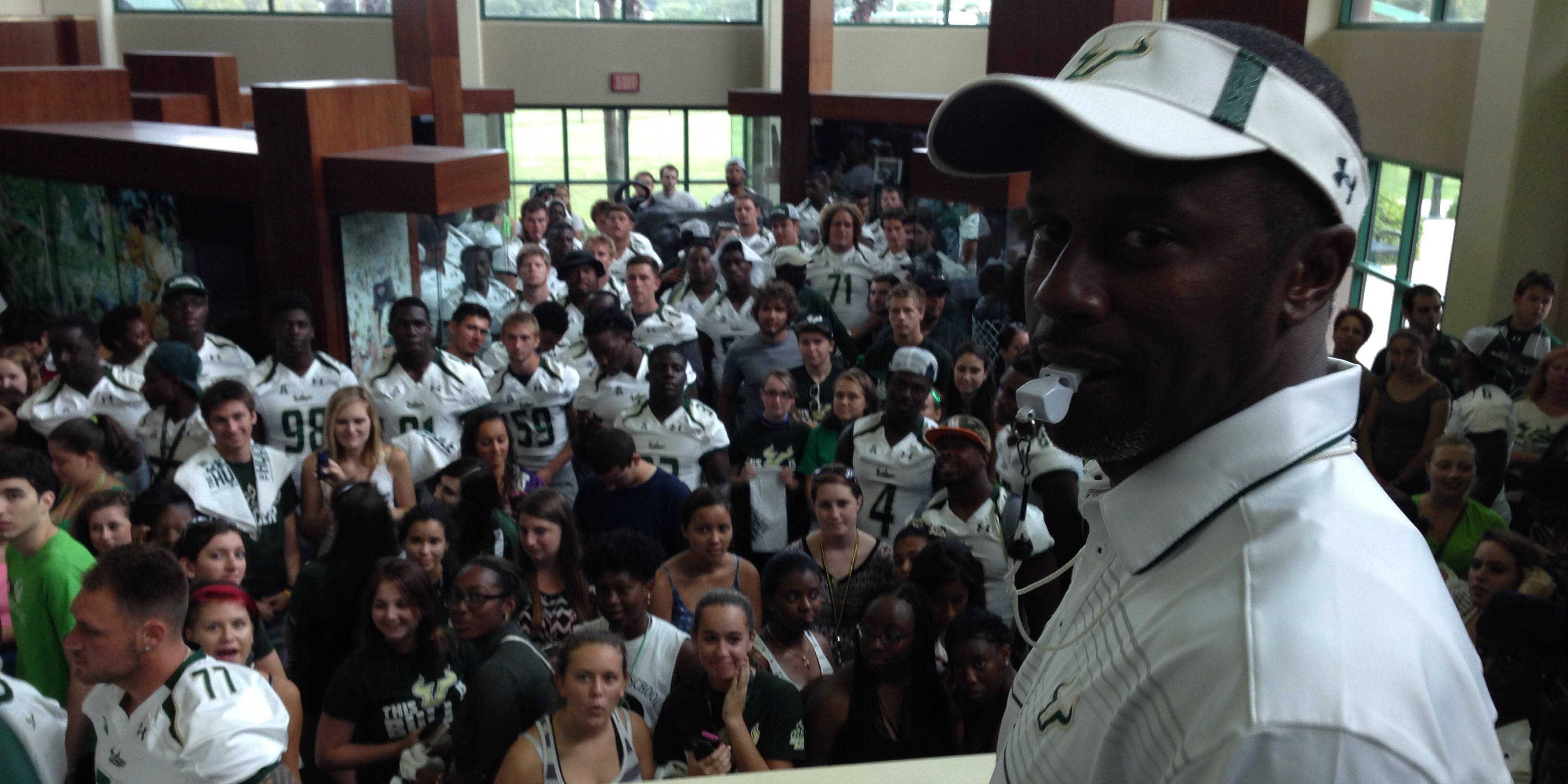 USF Students Get Fired Up for Football at The Huddle