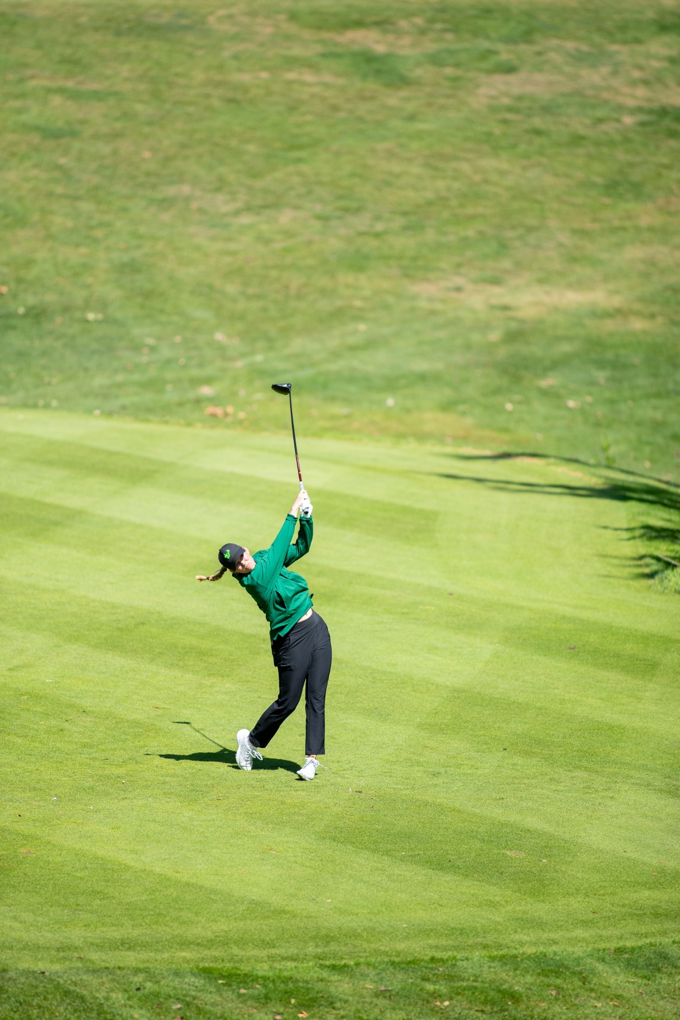 USF Women's Golf Player hitting the golf ball
