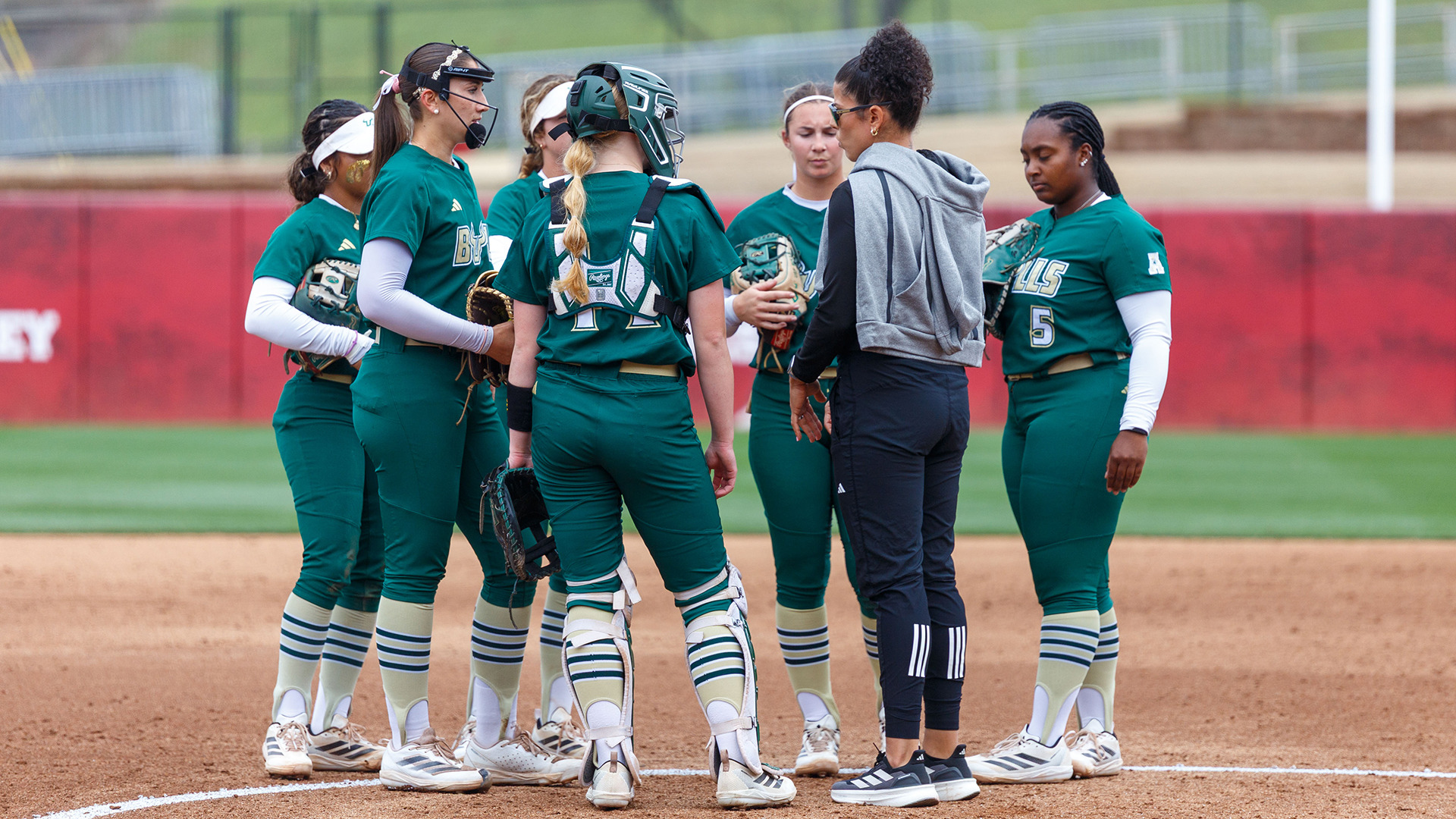 Softball in-game circle visit against Kent State