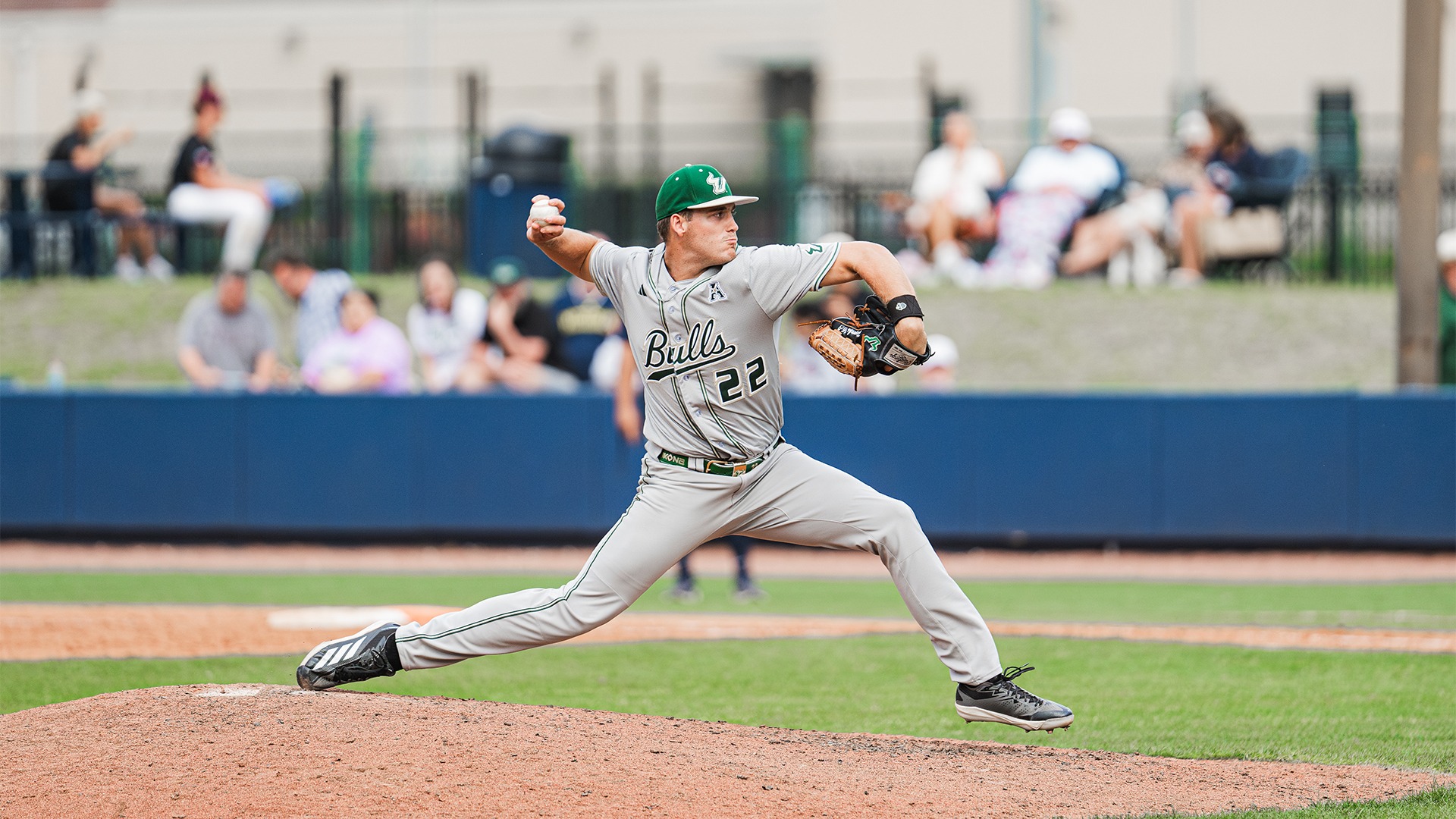 Ethan Sutton pitching while earning his seventh save.