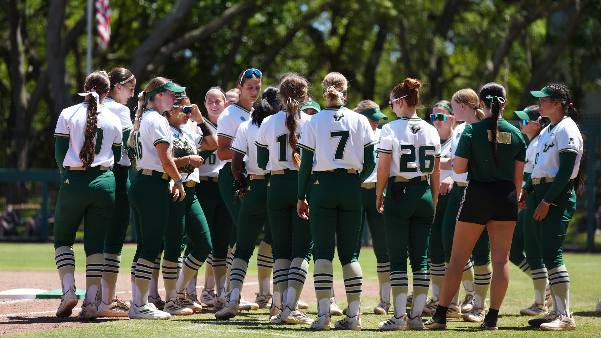 Softball team huddle during FAU on Sunday