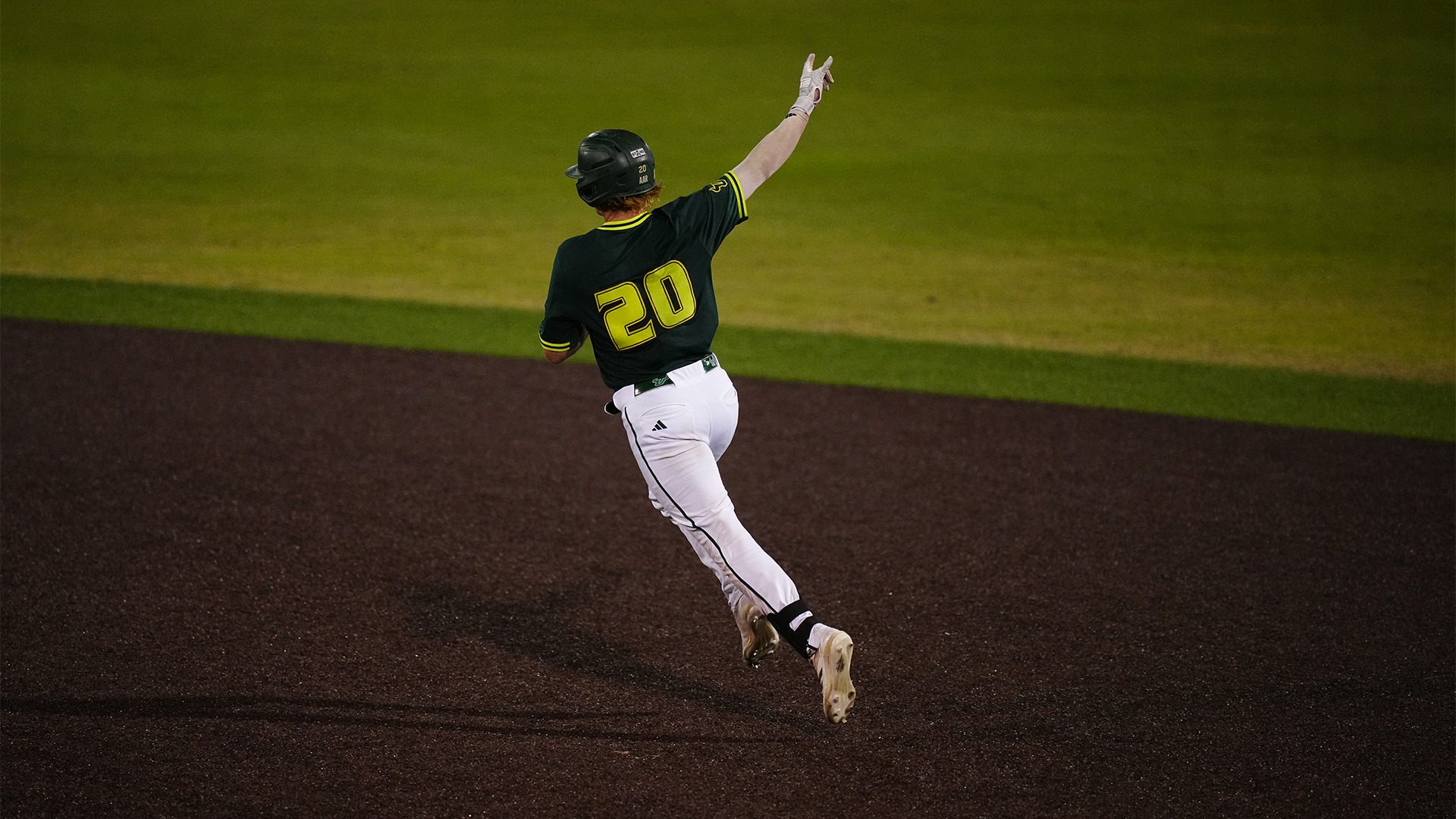 Lance Trippel rounds the bases after hitting a two-run home run.