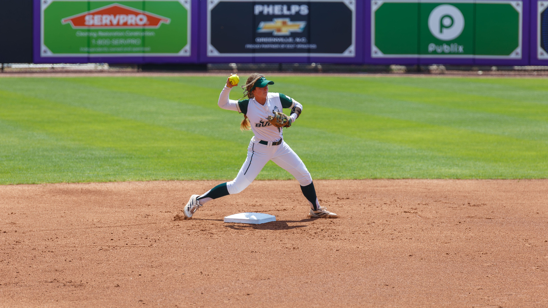 Alex Wilkes throwing to first against ECU