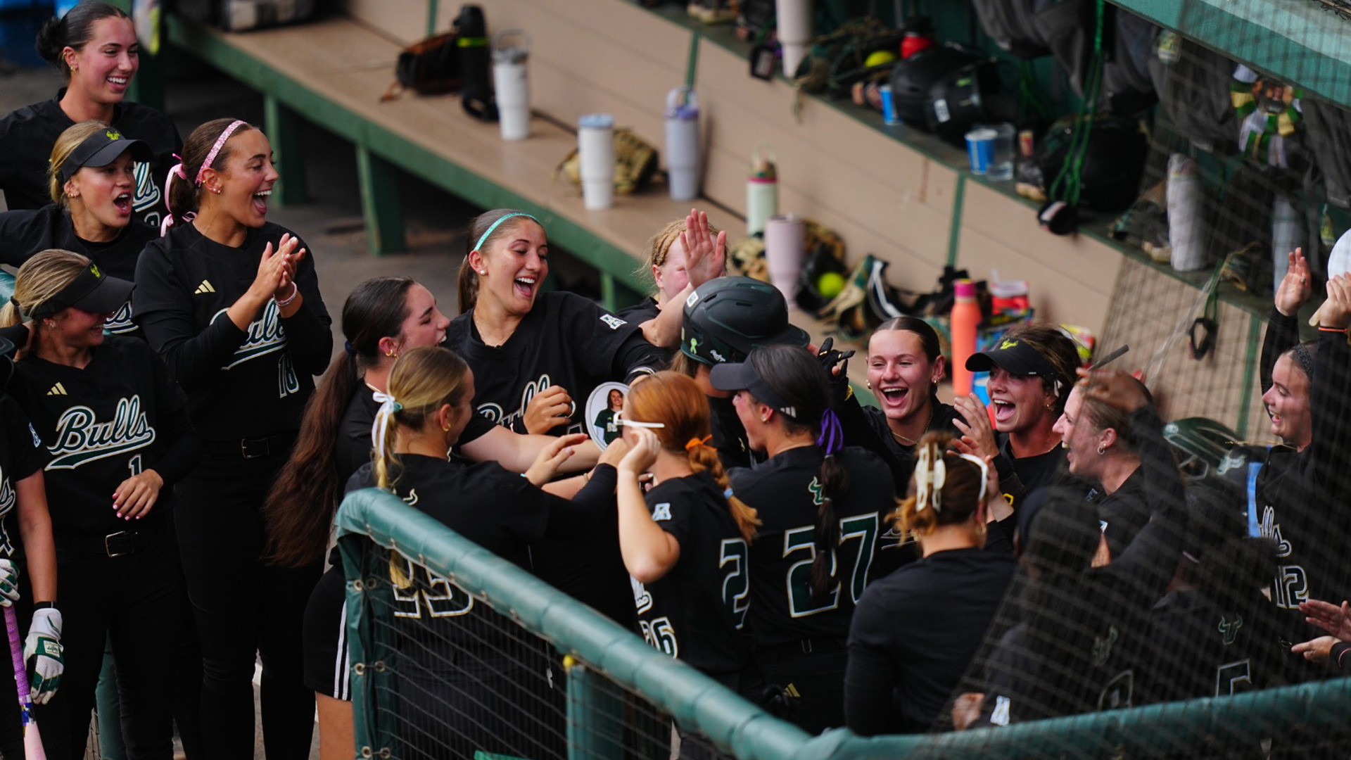 Softball dugout celebration vs North Texas