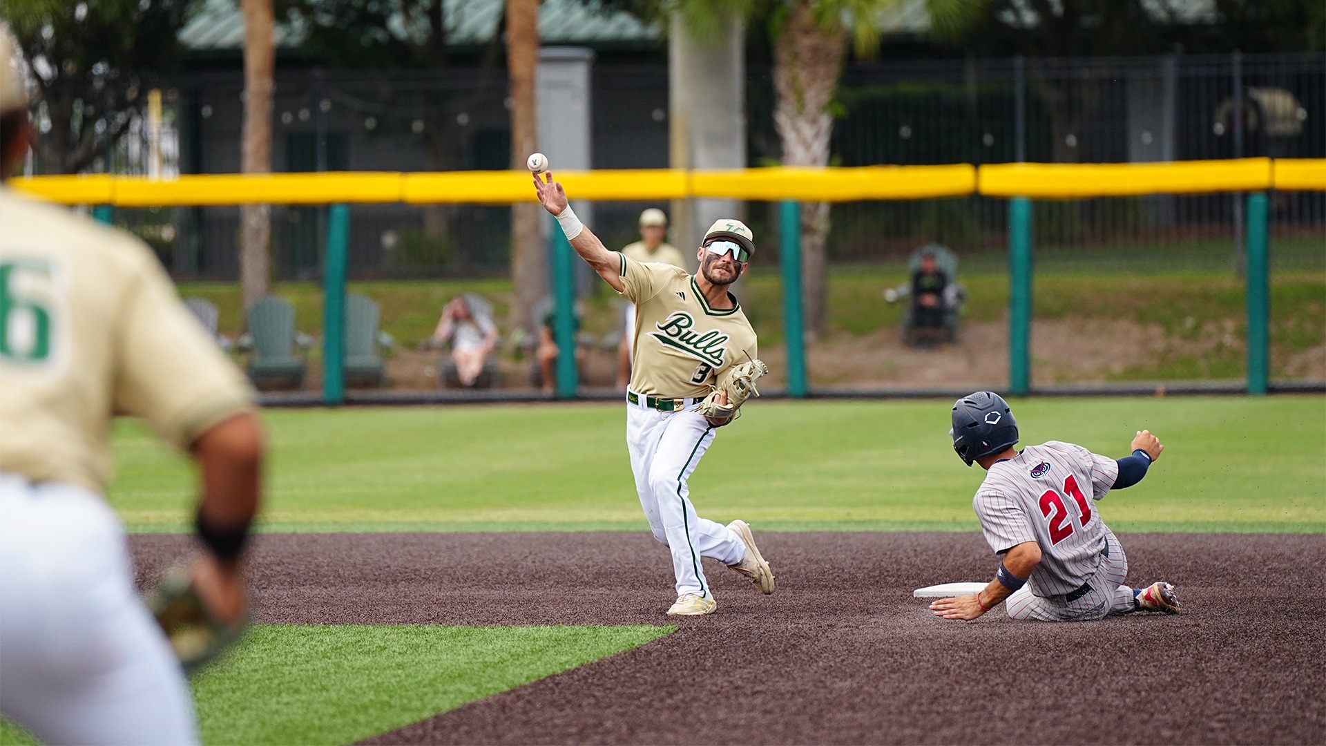 Bradke Lohry turning a double play.