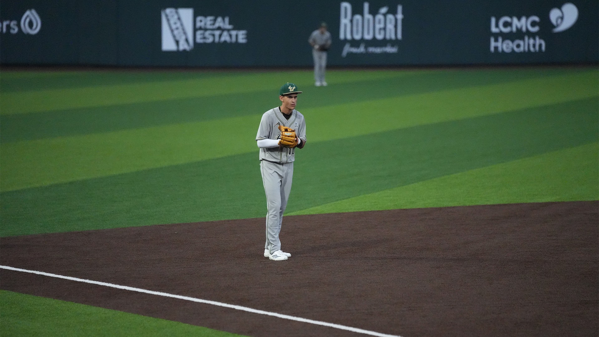 Jack Lutz preparing for a play at third.