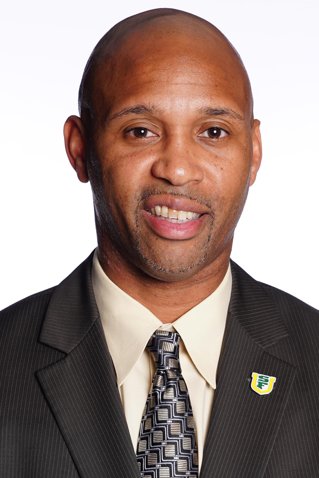 10/16/18: USF MBB Headshots and Marketing at War Memorial Gym in San Francisco, CA.  Image by Chris M. Leung for USF Dons Athletics.Associate Men's Basketball Coach Derrick Phelps