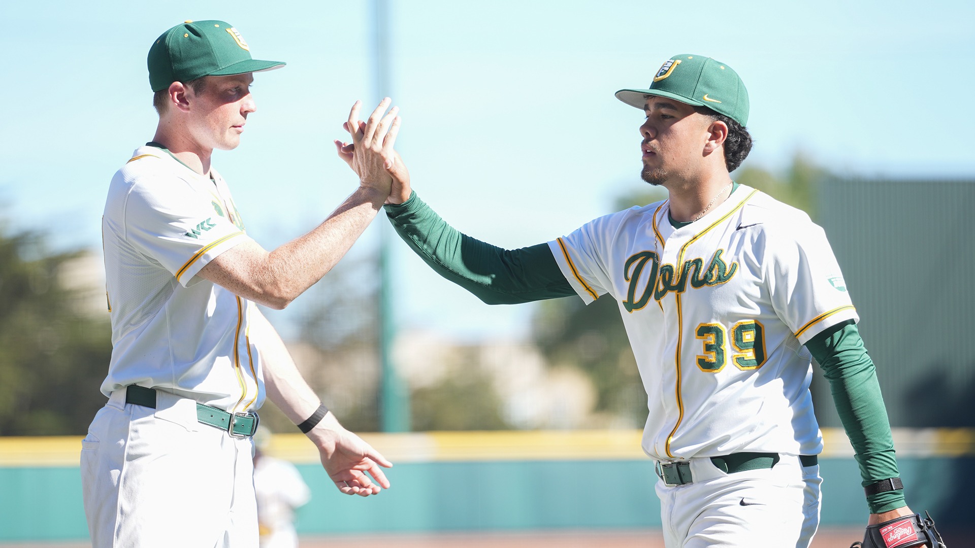 Alan Gonzalez high fiving Cal Amborn vs. Sac State 2026