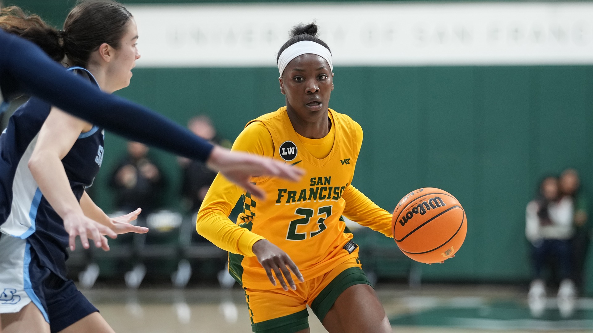 Candy Edokpaigbe dribbling vs. USD 2026