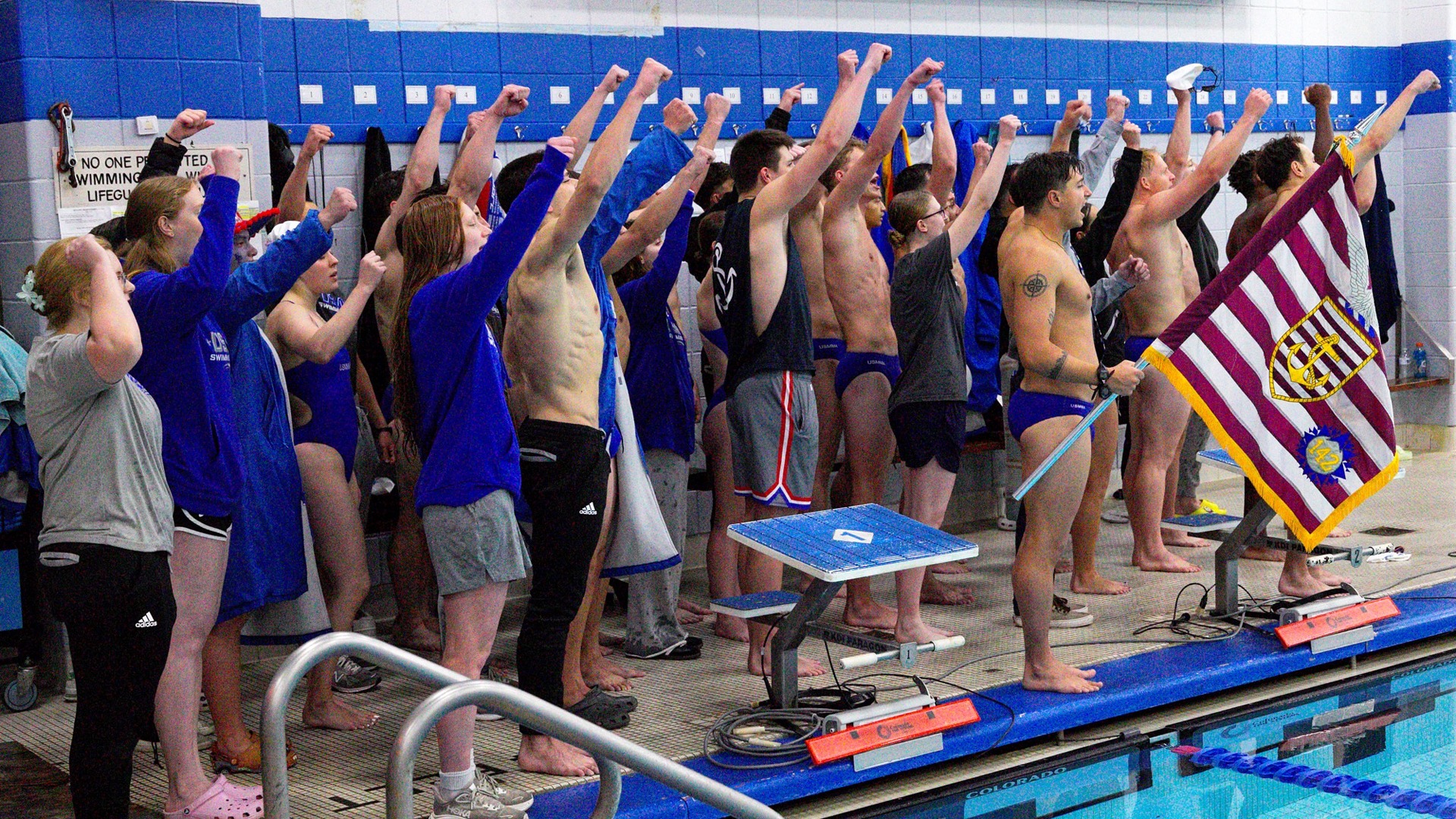 Men's Swim & Dive Beat Coast Guard Alma Mater