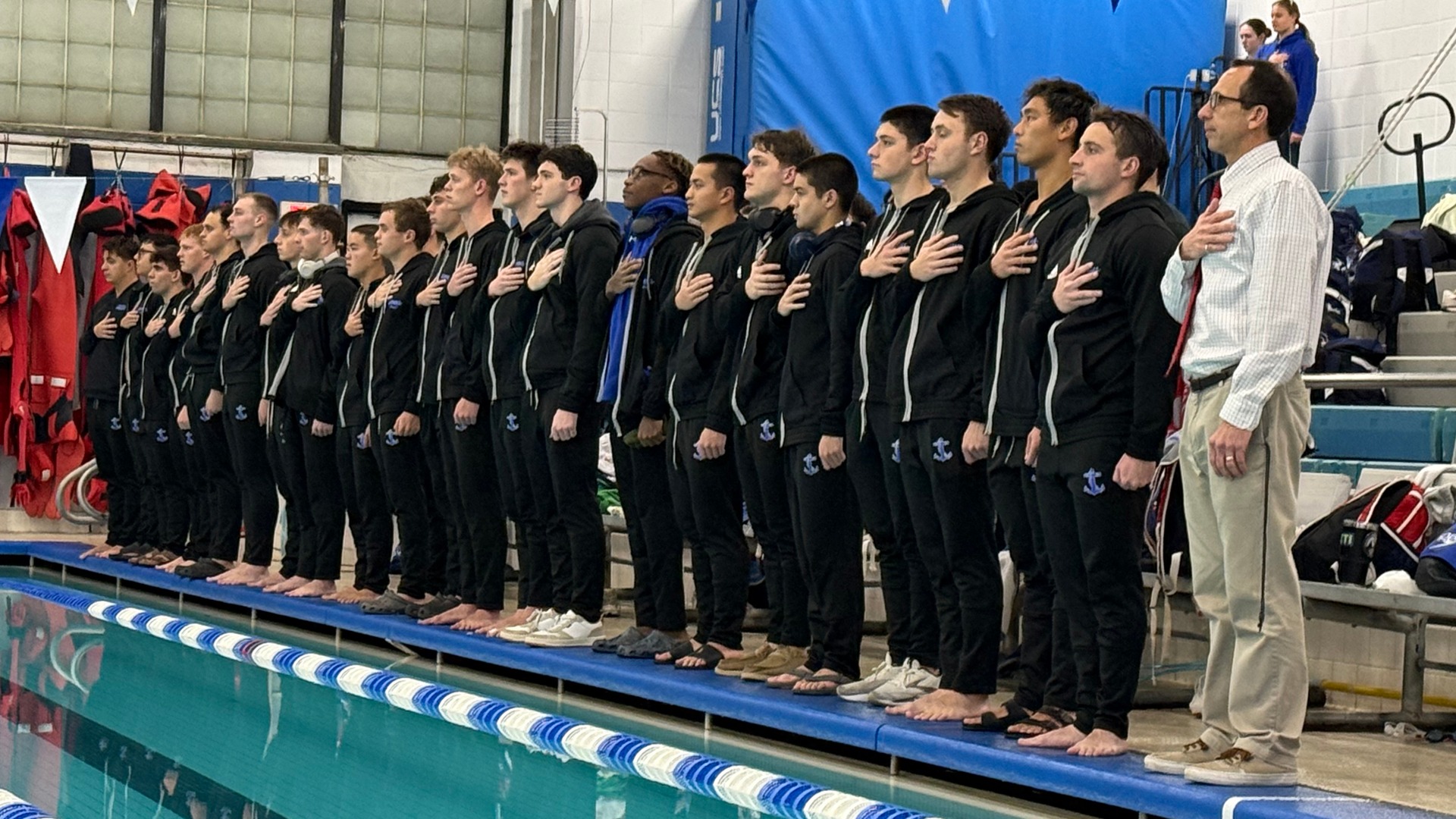Men's Swim & Dive Standing for National Antem vs. Baruch
