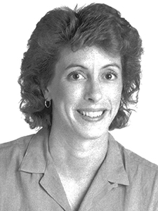 head coach lisa love 1987 volleyball headshot