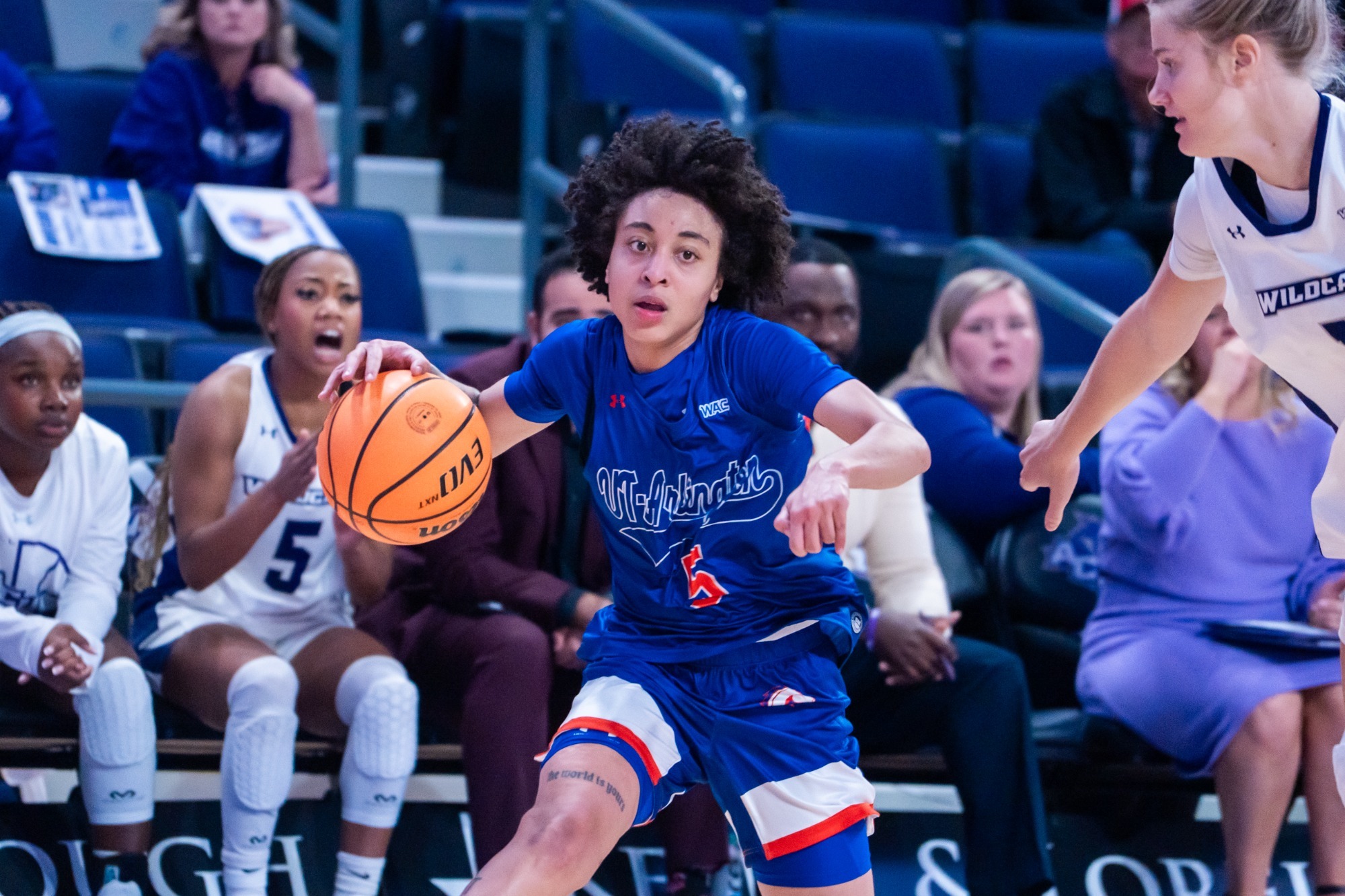 PG Nya Threatt driving during a game against Abilene Christian