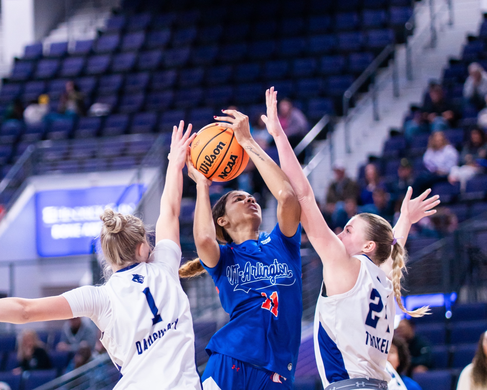 Kira Reynolds driving against Abilene Christian