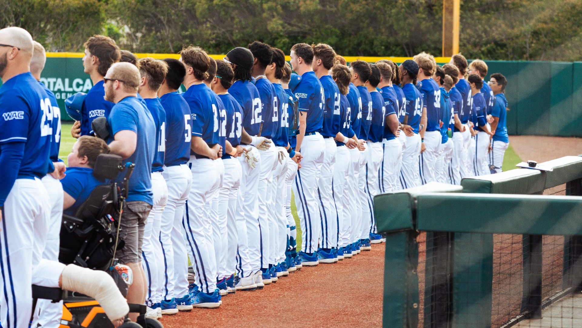 Team standing during national anthem