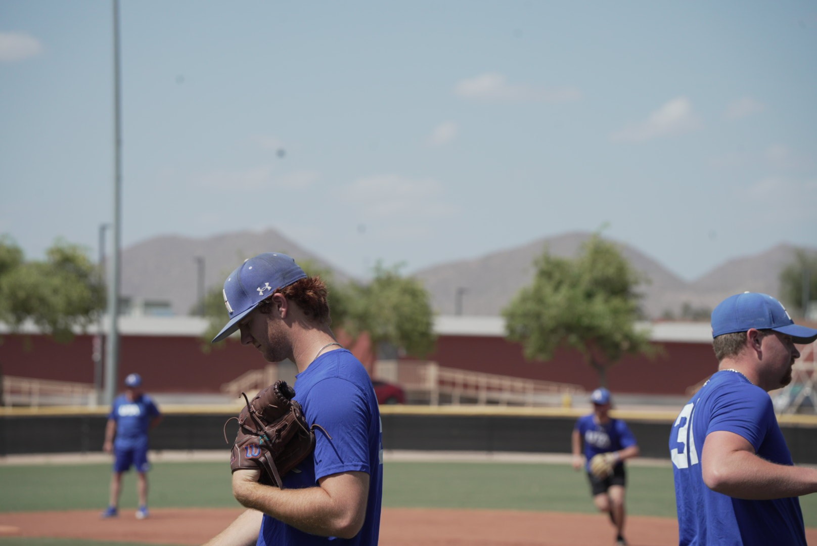 Baseball practice, mountain backdrop