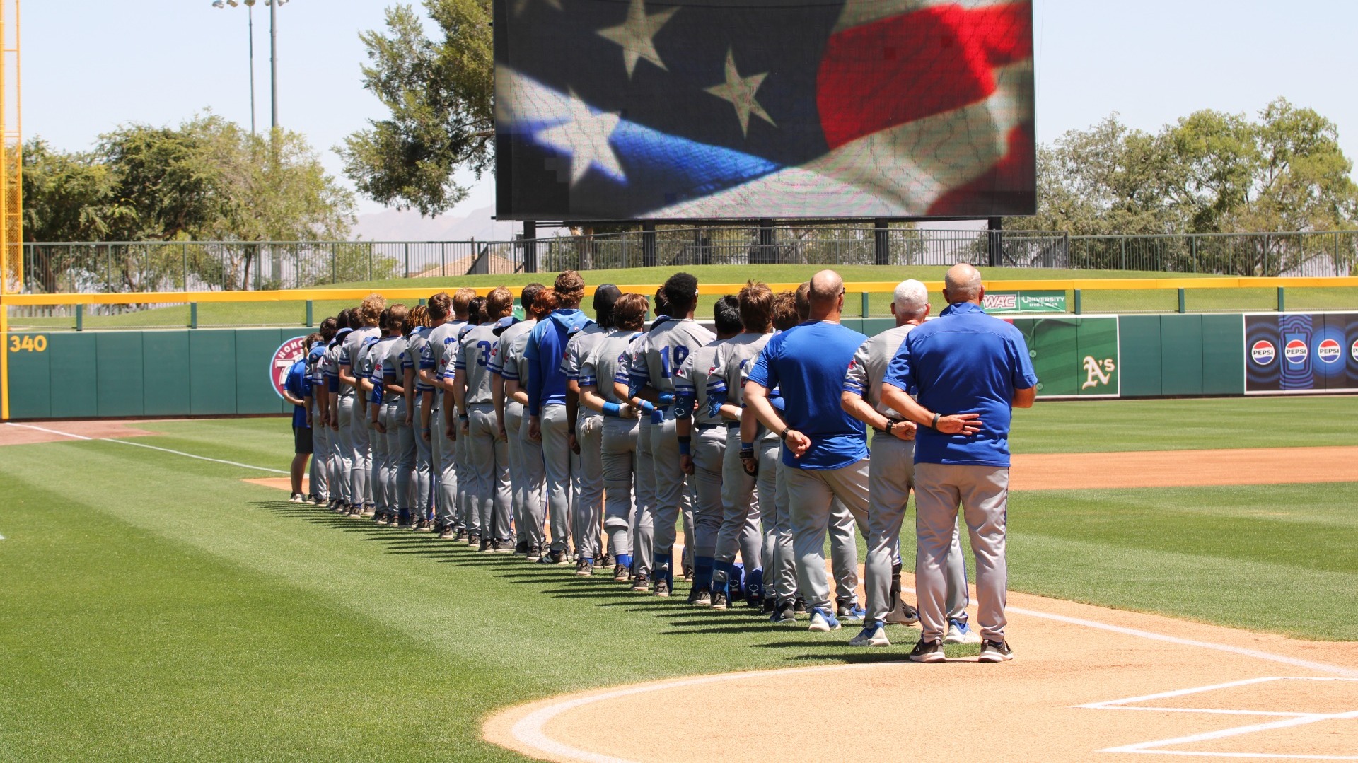 Team standing for national anthem