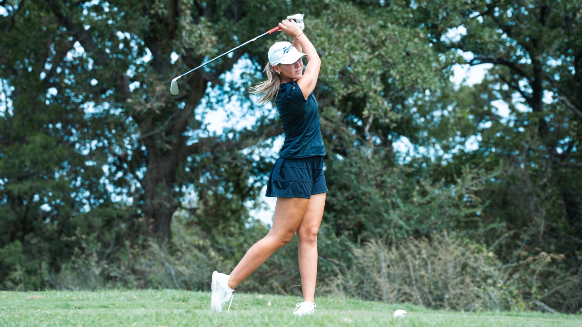 Kylie Ruston tees off during a qualifying round.