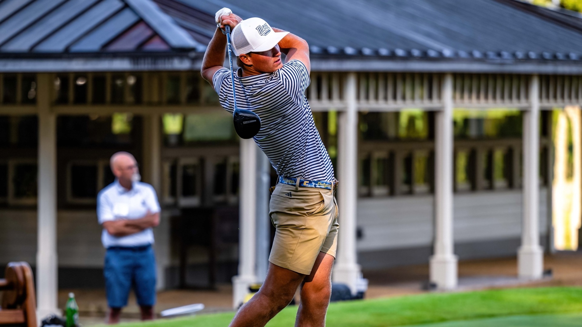 Griffin Law holds his finish following his tee shot at the Honors Course