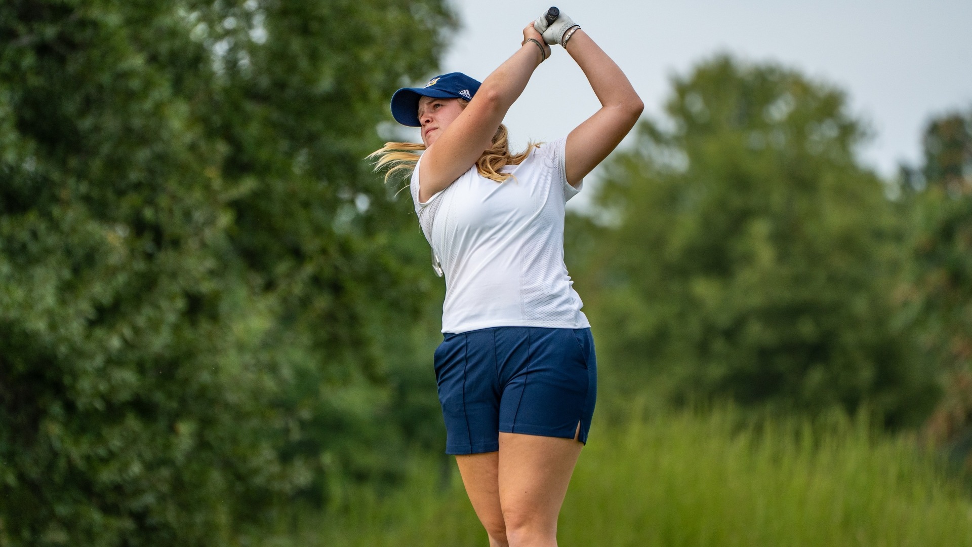 Kera Healey finishes her swing and tracks her shot at Vandy