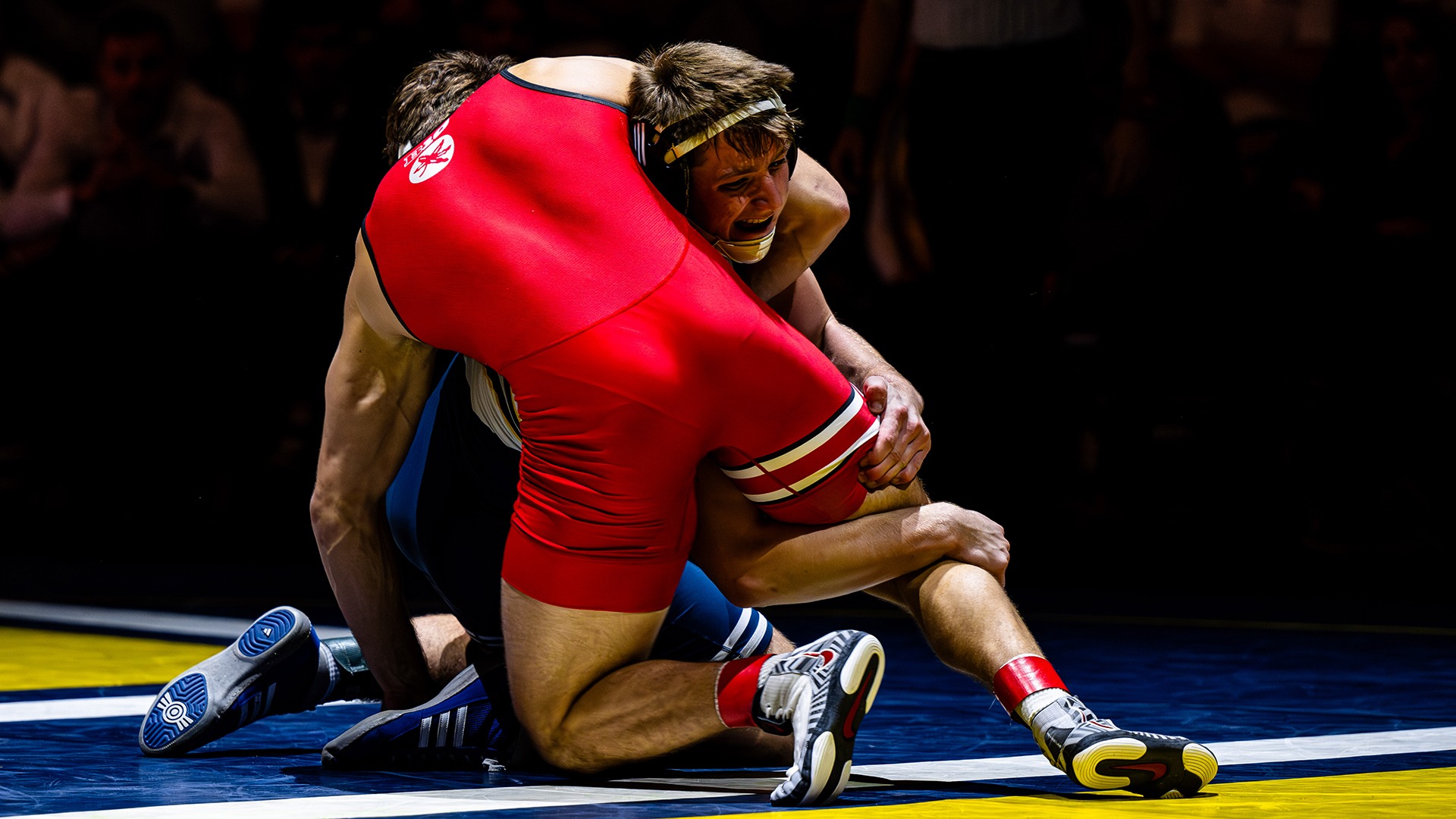 Kade Rule gets a deep shot in his high-scoring bout with Ohio State