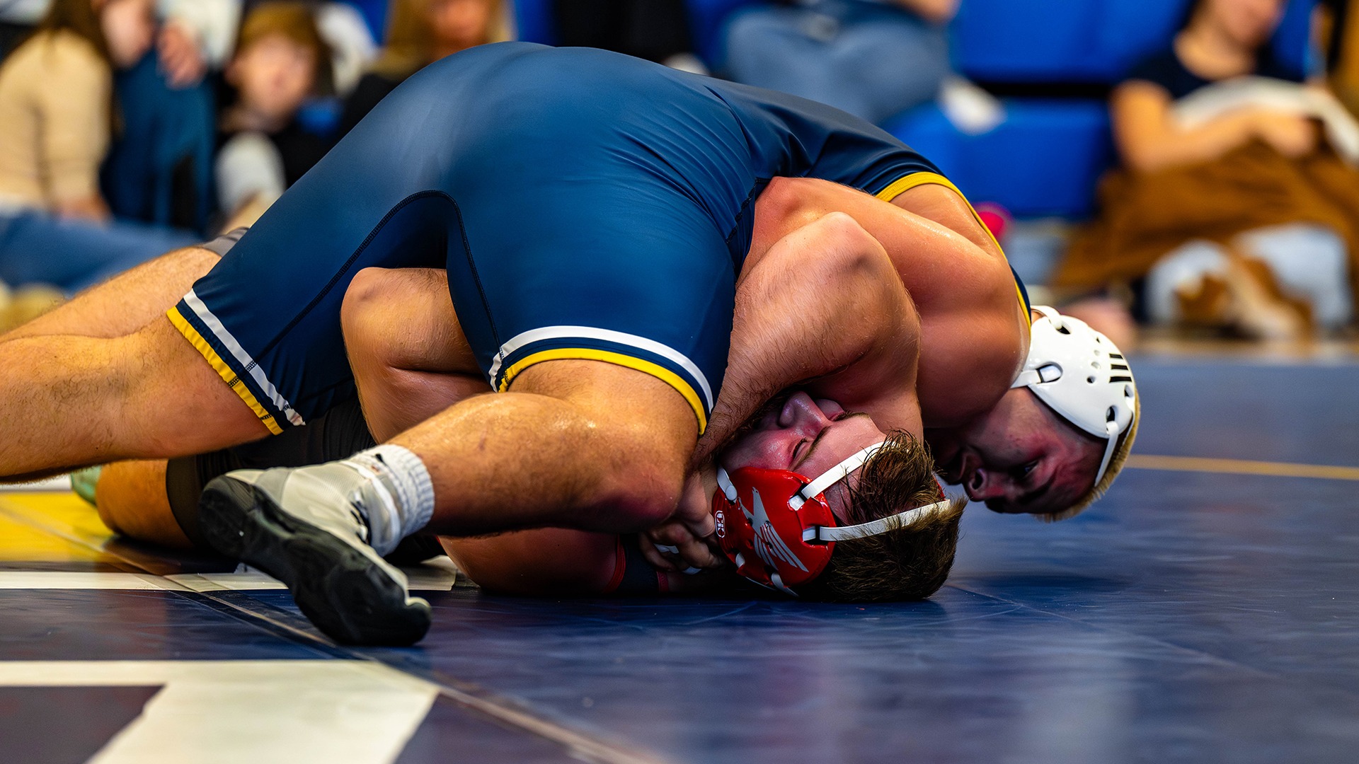 Ethan Vergara has his man locked in awaiting the slap of the referees hand on the mat