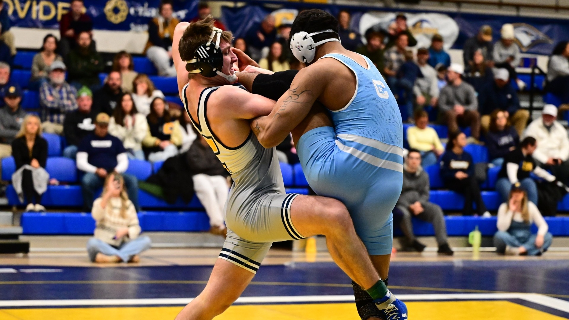 Kade Rule gets a single leg and looks to clip the grounded one in a dominating tech fall triumph