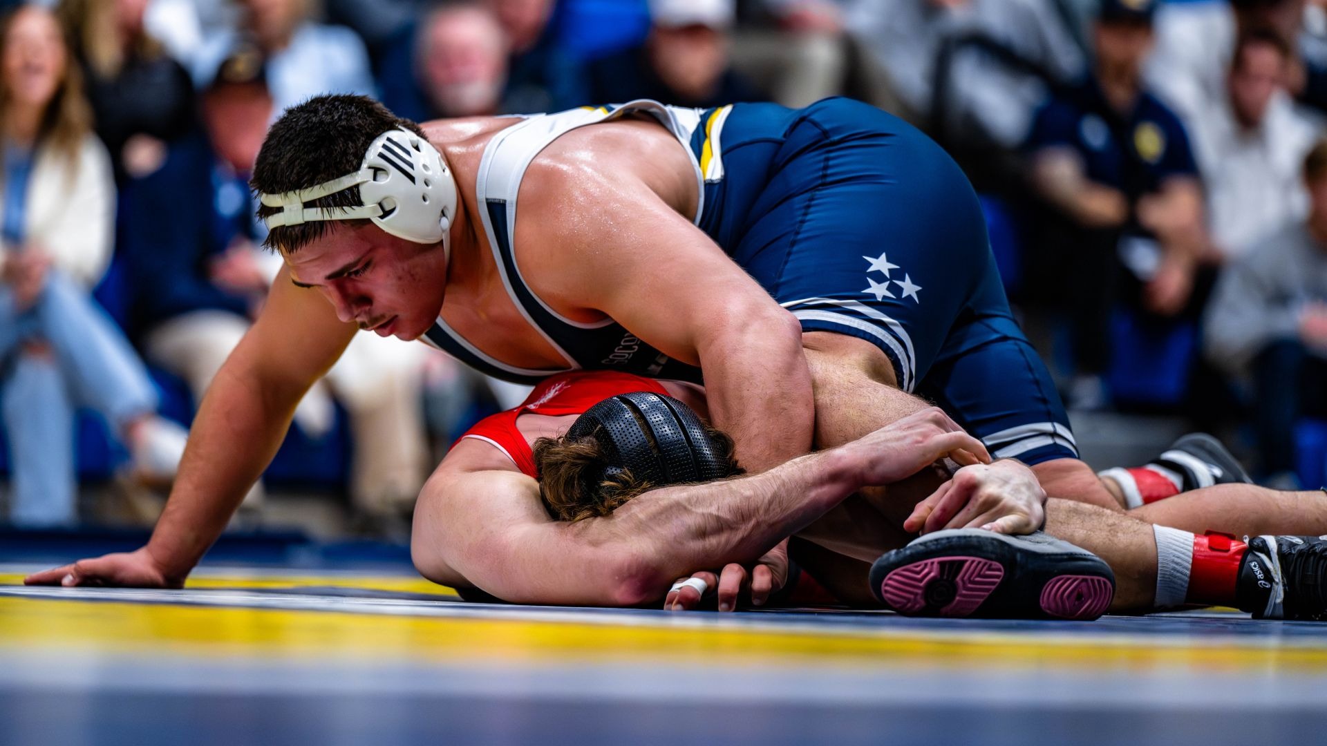 Ethan Vergara works in a dominant position on top against Davidson