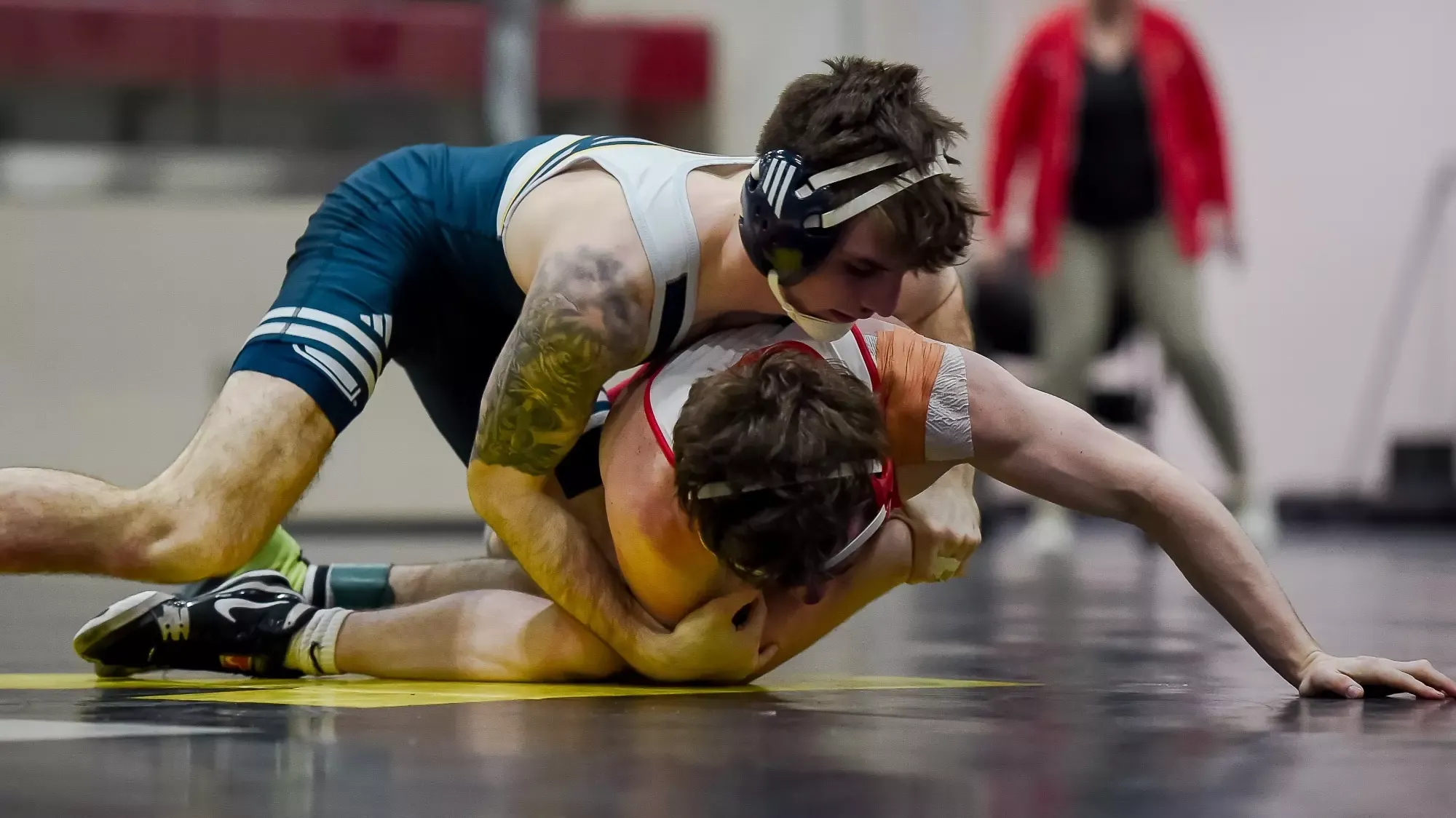 Ethan Uhorchuk looks to turn his VMI opponent and earn back points in a dominating win