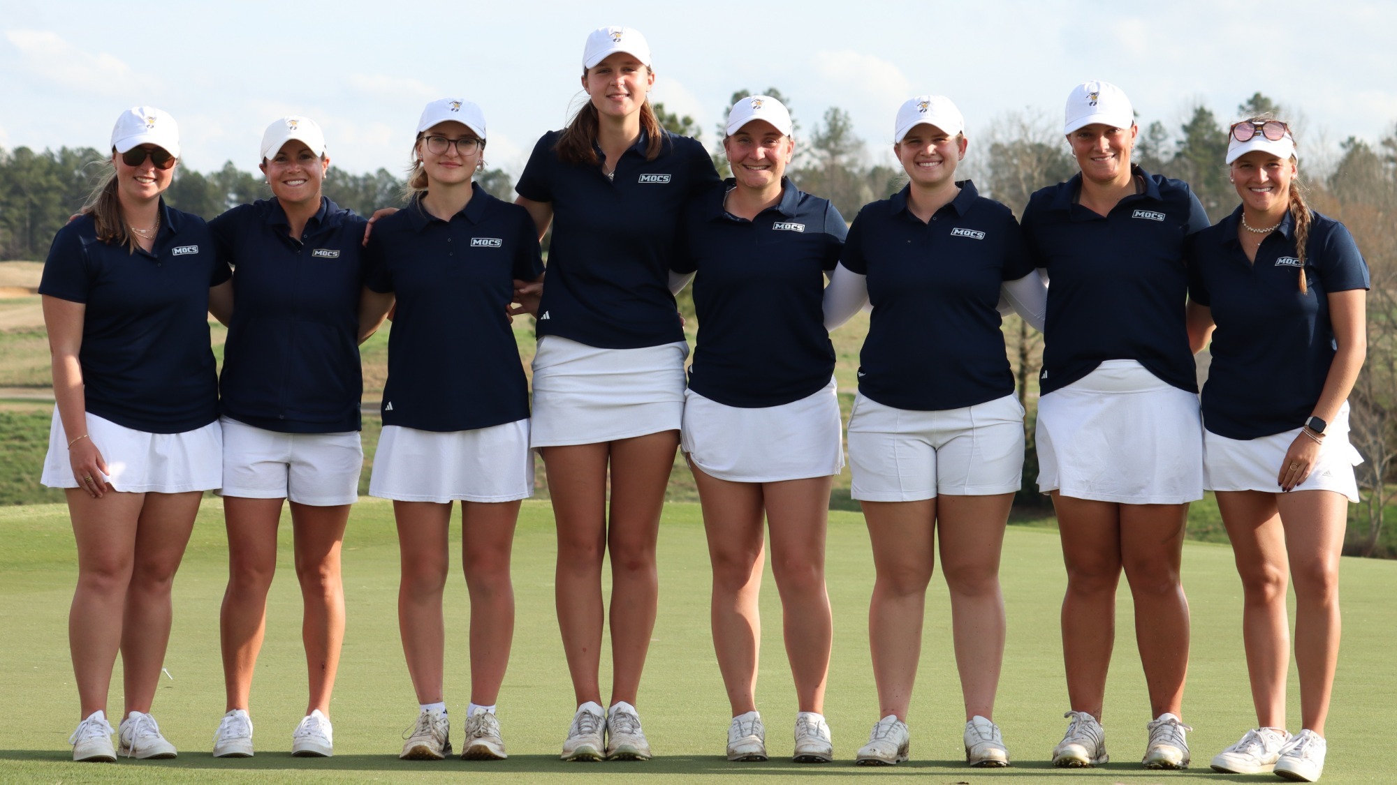 Team picture after the Chris Banister Invite. Cutline (L-R): Asst. Coach Blakesly Brock, Coach Katie Woodruff, Rugile Pauliukonyte, Erin Wells, Makenzie Cooper, Kera Healey, Bella Bugg, Asst. Coach Carolina Hortian
