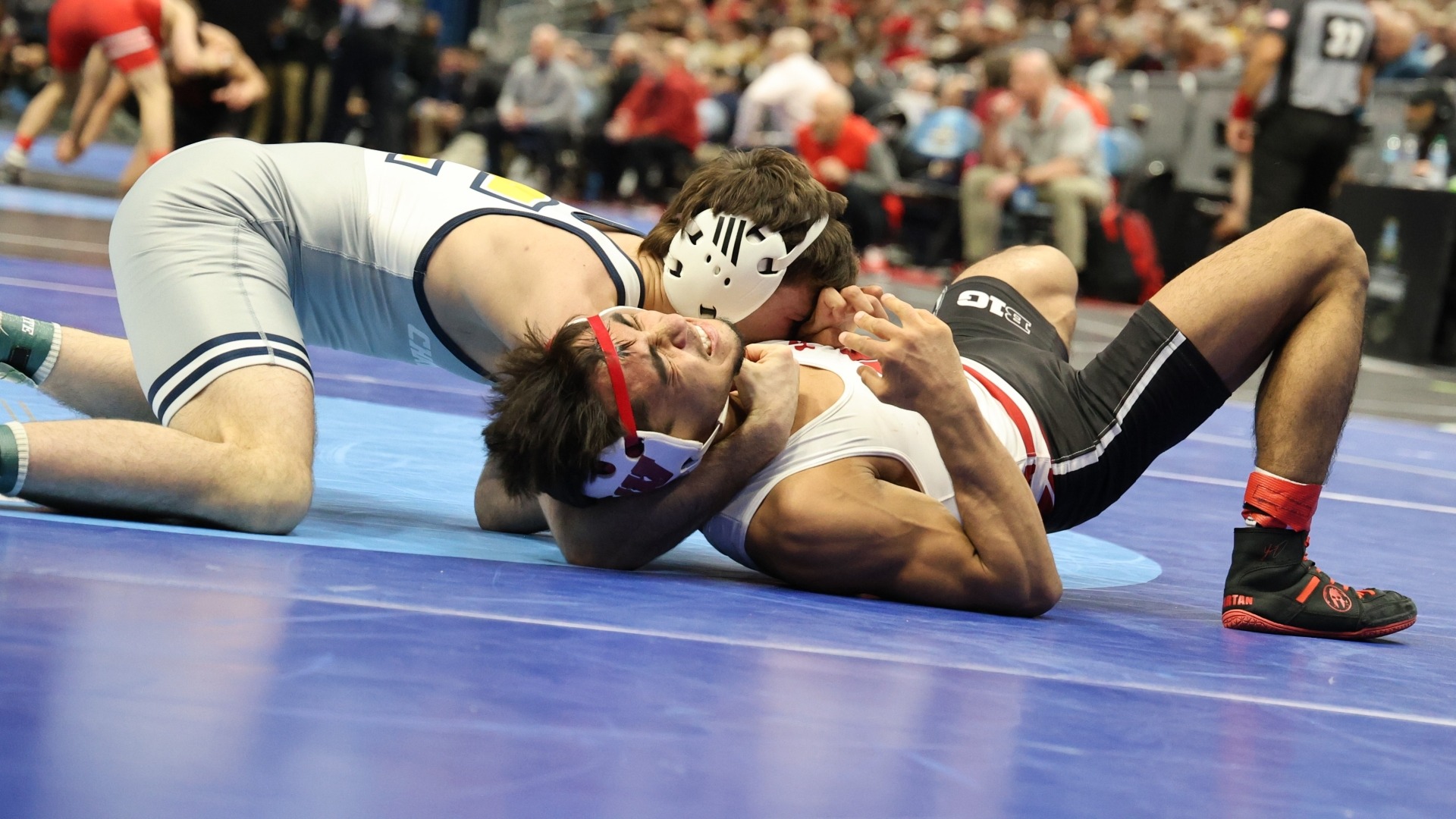 Cooper Flynn gets his opponent on his back in his Day 1 win at the NCAA Championships.