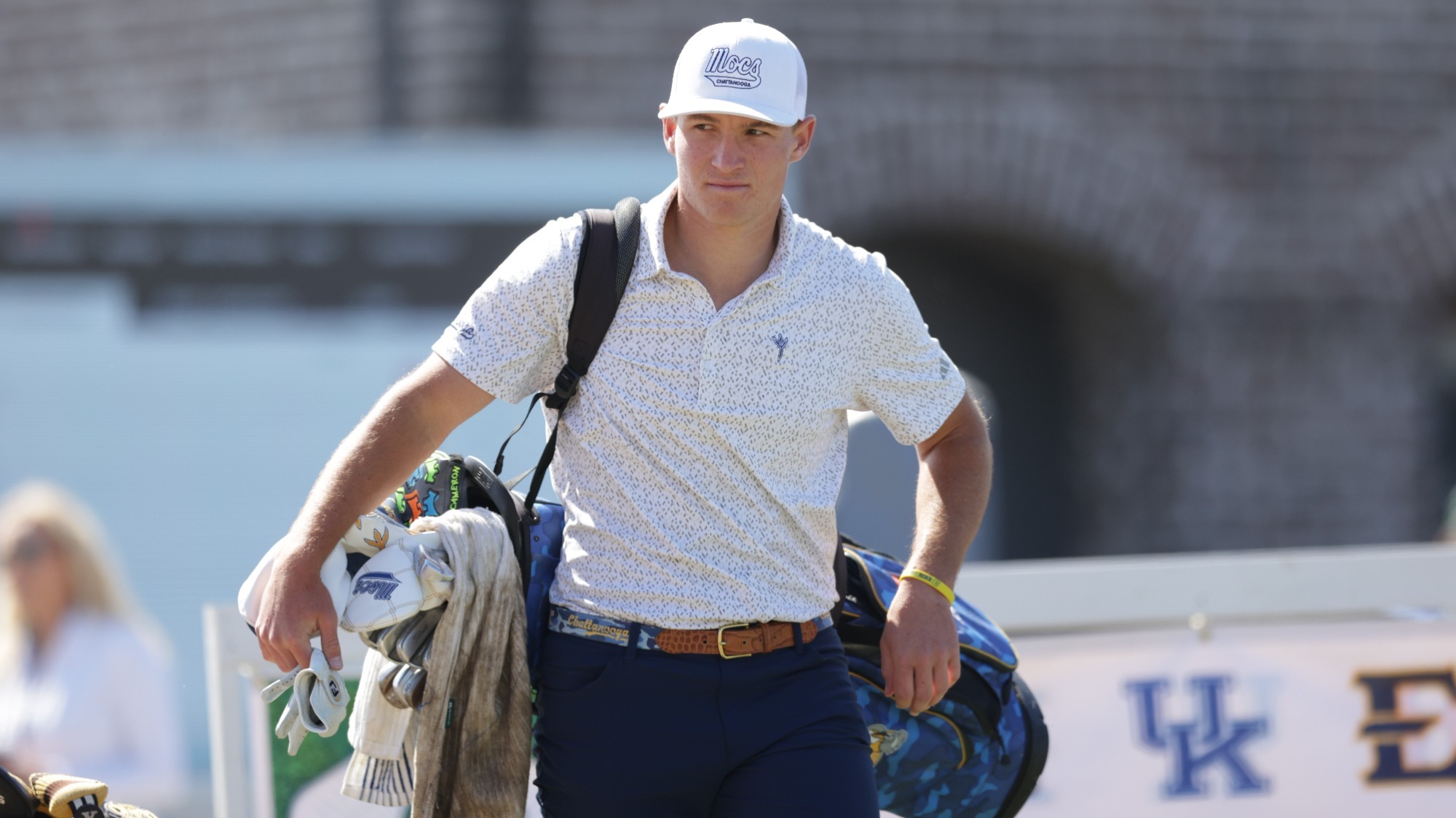 Griffin Law has his bag over his right shoulder as he starts to leave the tee.