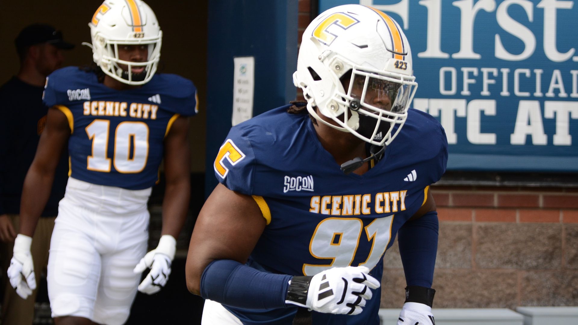 Montrell Henderson takes the field in pregame warmups at Finley Stadium