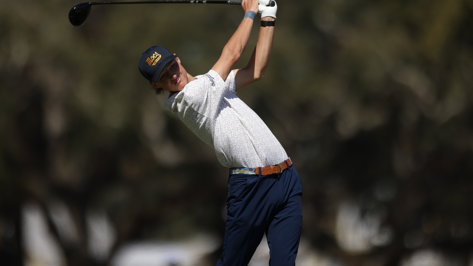 Evan Rogers watches his tee ball as he finishes his swing at Colleton River