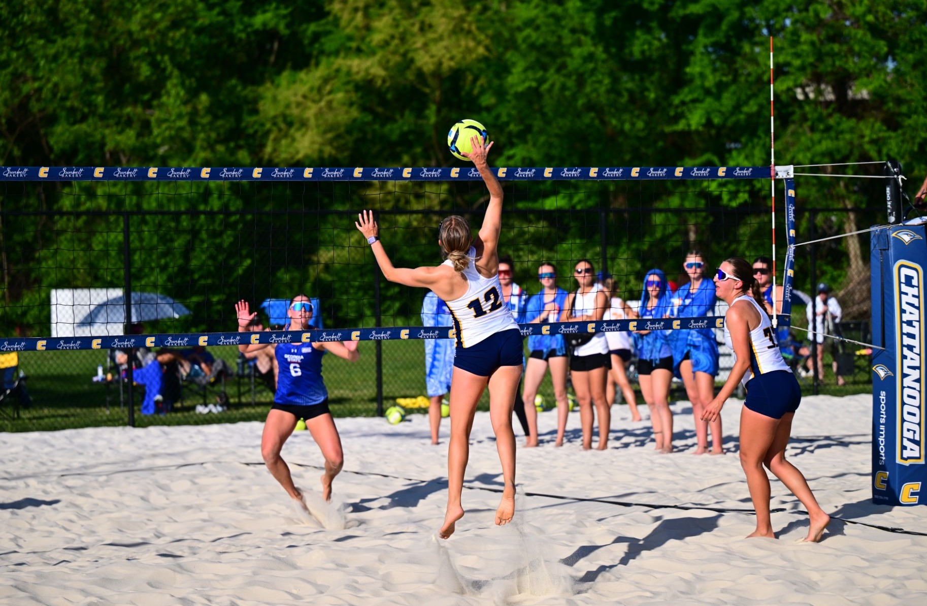 McKenna Faychak spiking the ball against Georgia State 