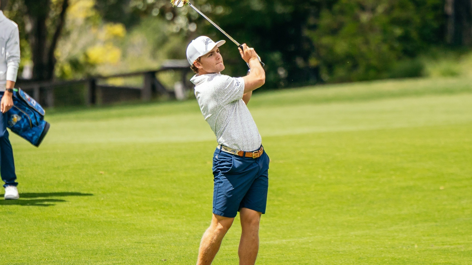 Thad Whitfield stares down his wedge shot on his approach to the green at Pasatiempo