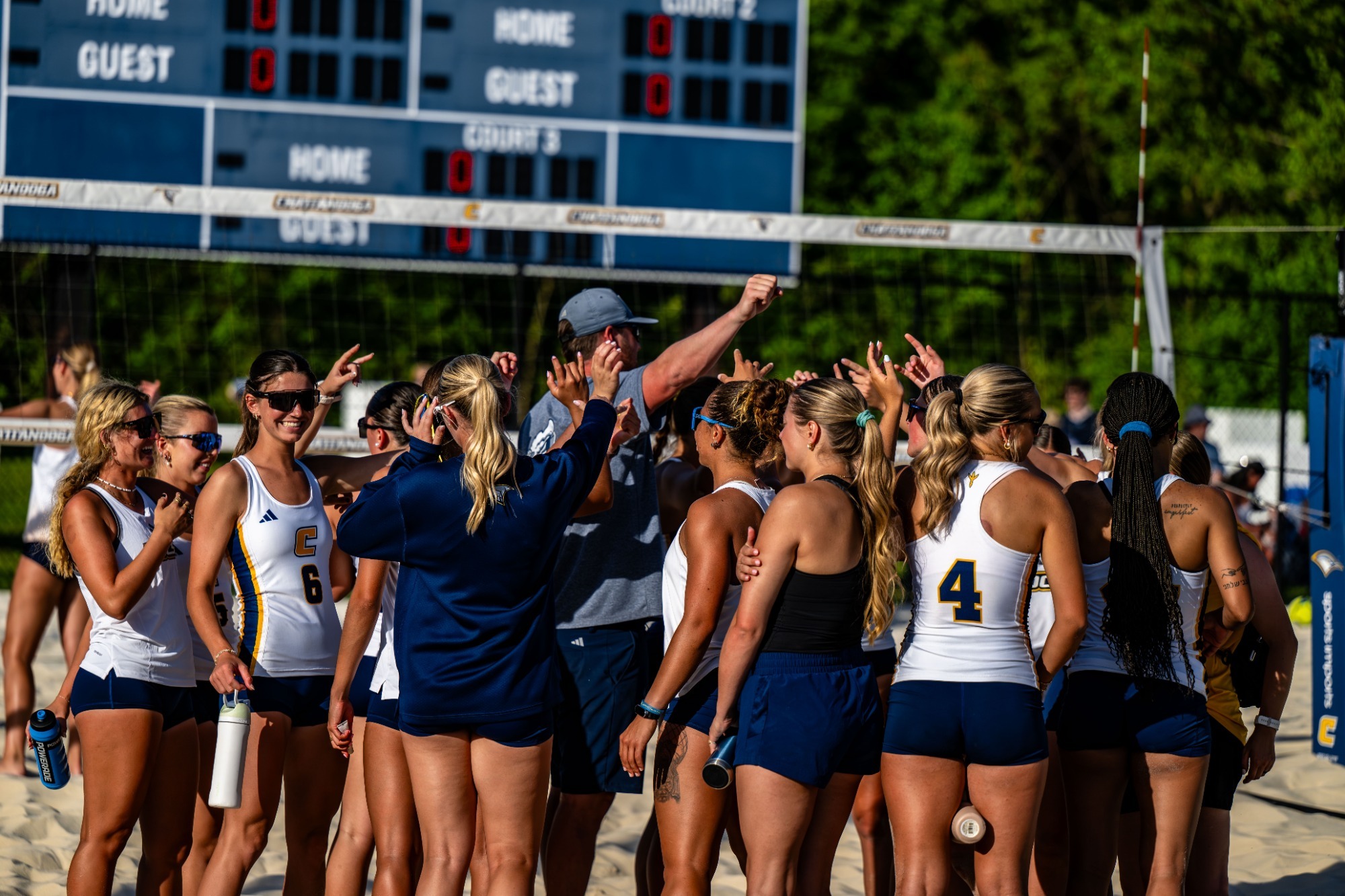 Team huddle after playing Georgia State 