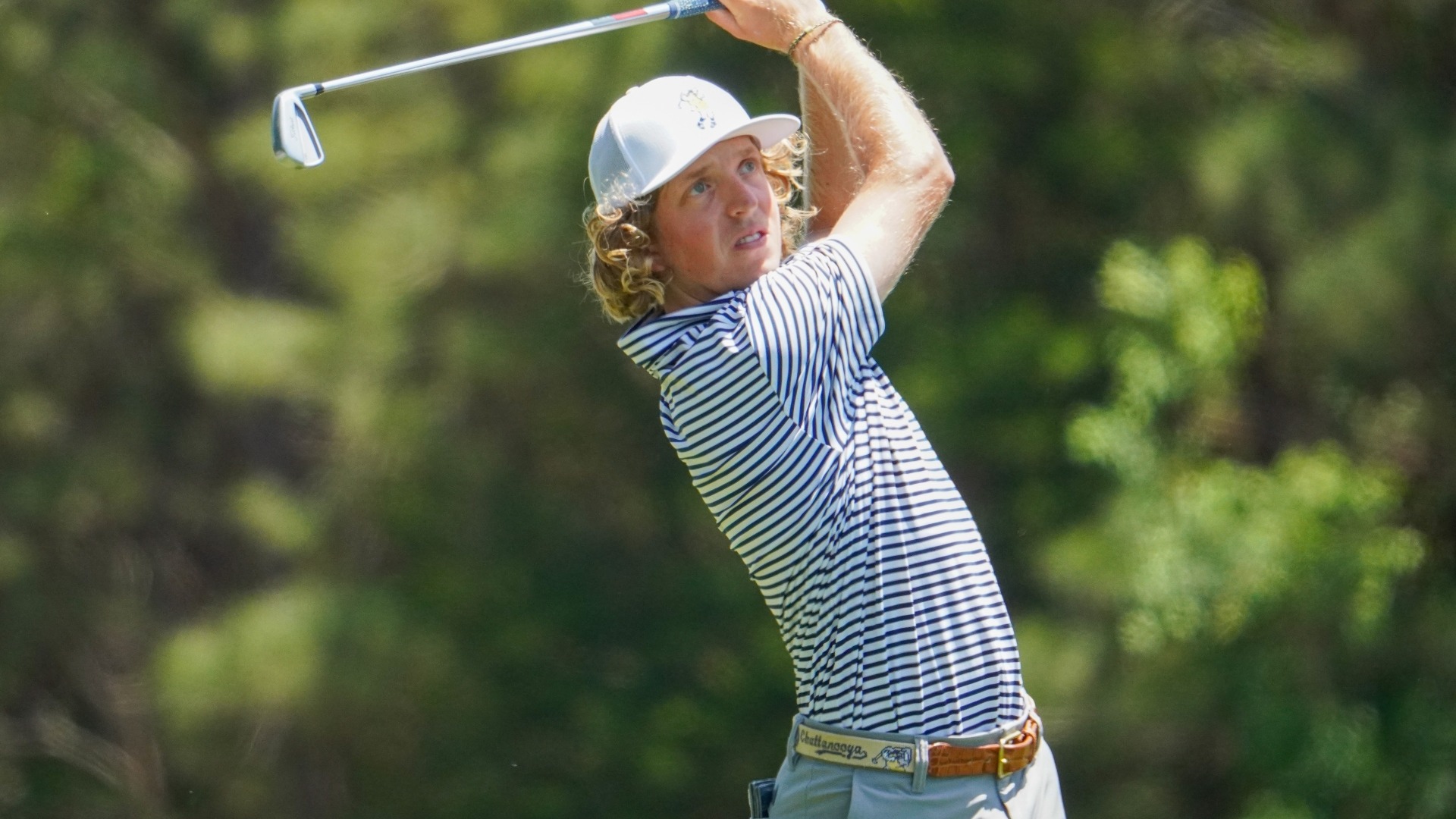 Camden Braidech tracks his shot with a high finish