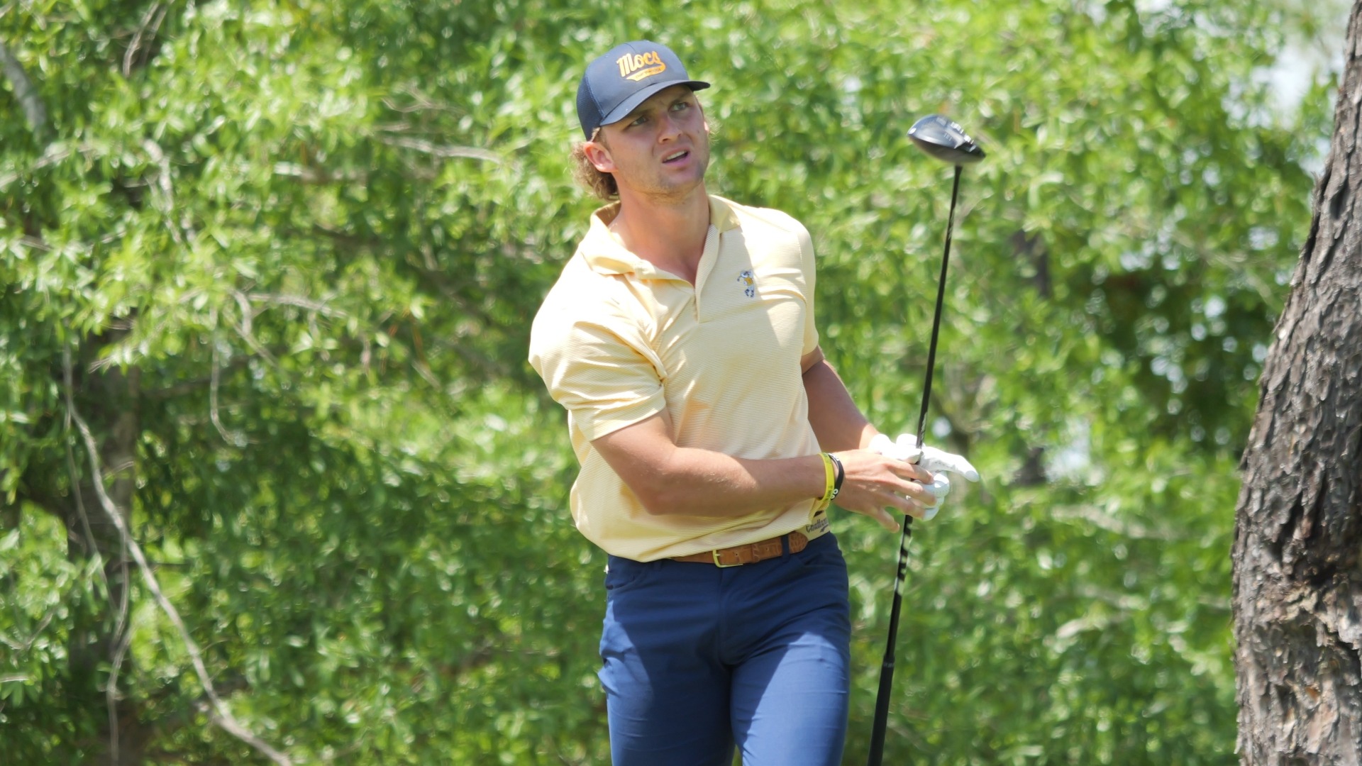 Ward Harris takes a step forward with his club in front as he stares down a drive that ended up on the left edge of the fairway