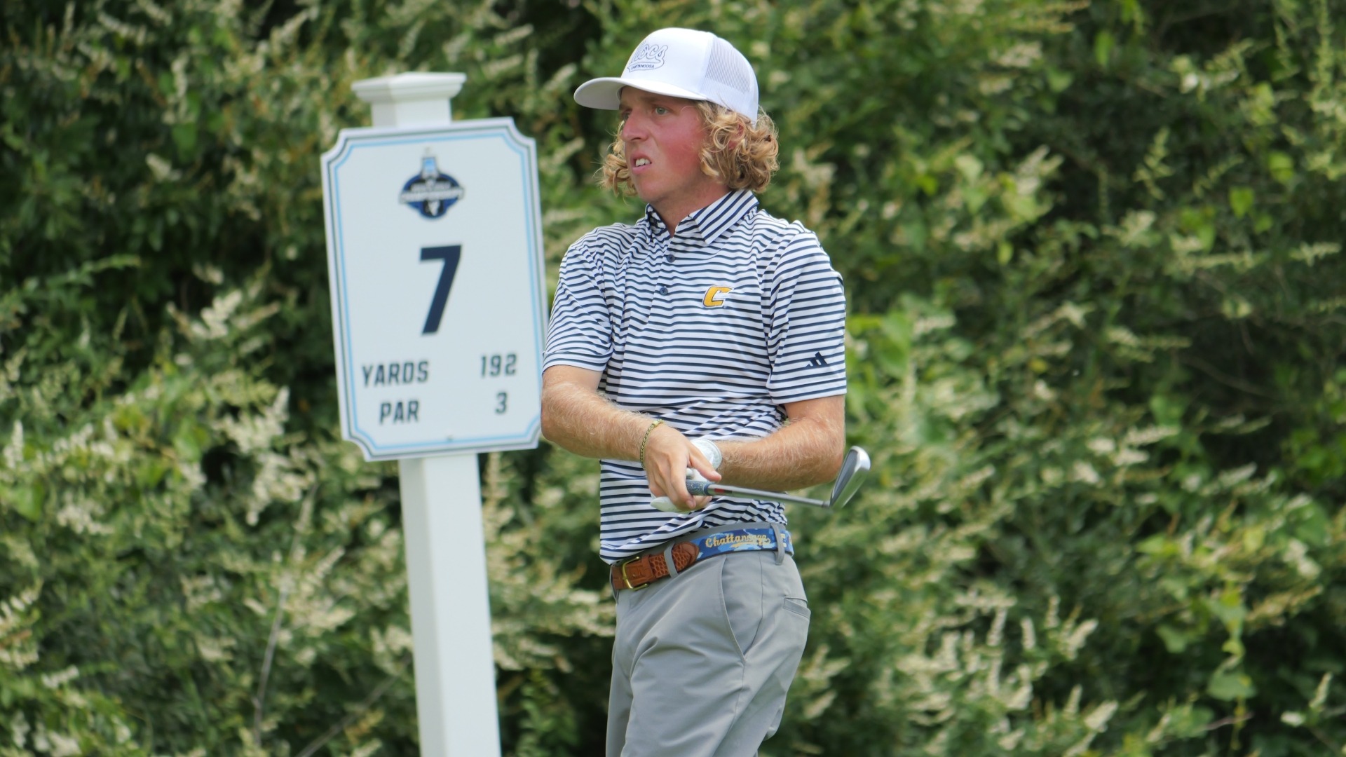Camden Braidech stares down his tee shot that led to a birdie on the par 3 7th at the NCAA Bryan Regionals.