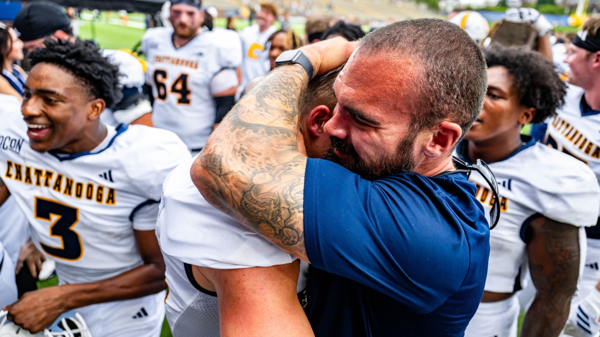 Gerry Pacitti with a Mocs Football player after a win 
