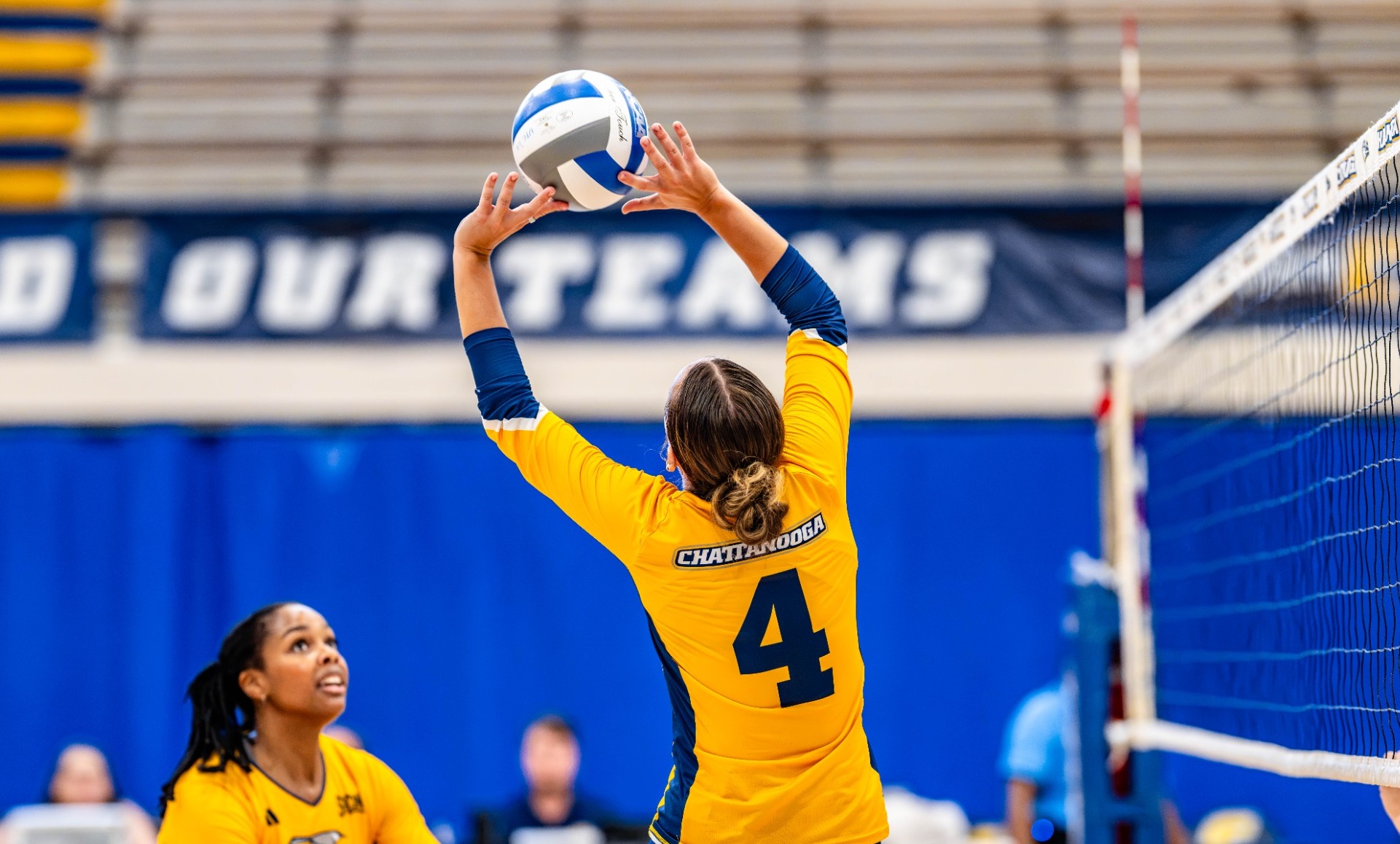 Mallory Merz setting Kynli Kirkendoll in the scrimmage vs. GCSU