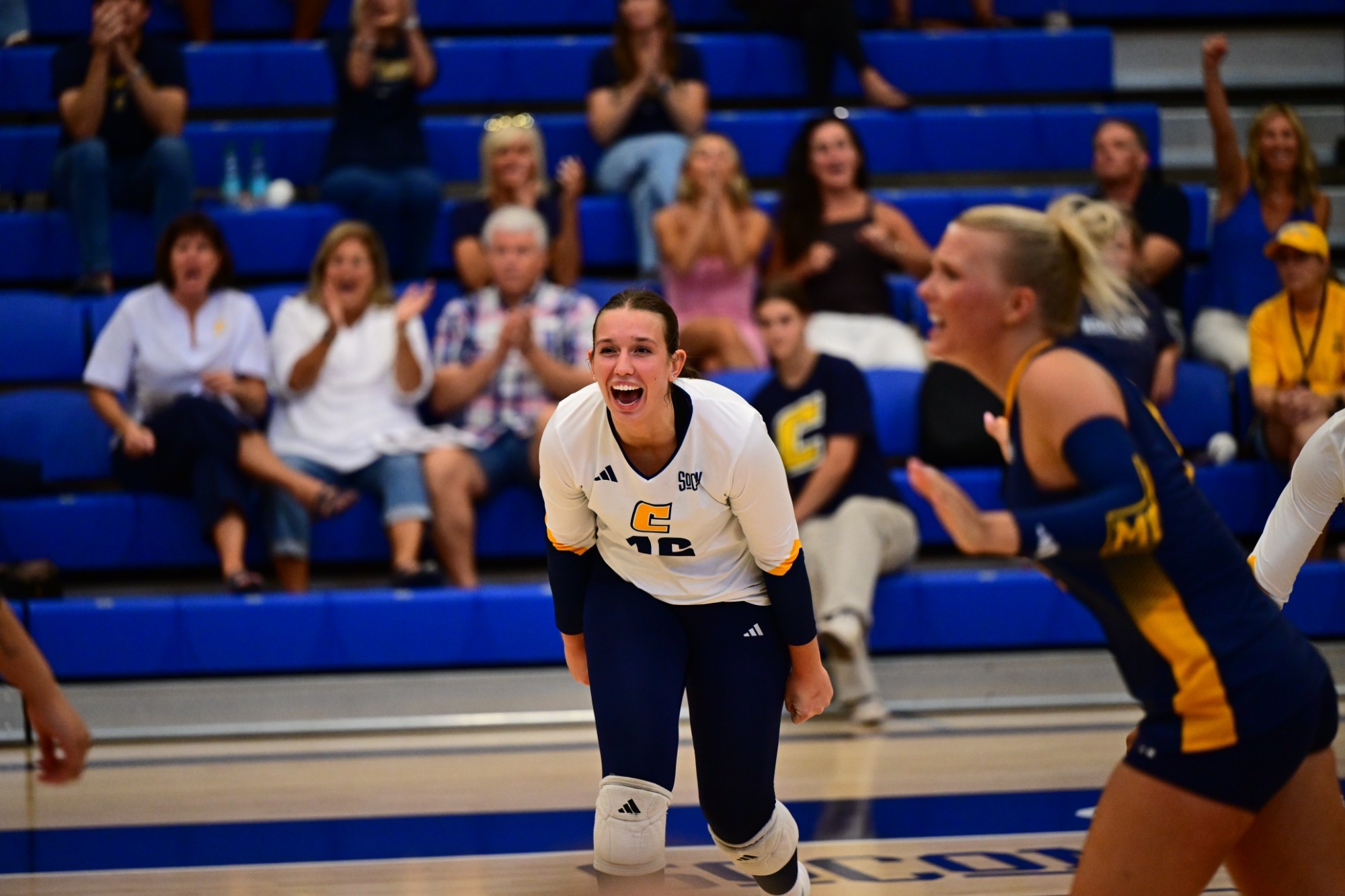 Ashley Reynolds yelling after winning a point against Valpo