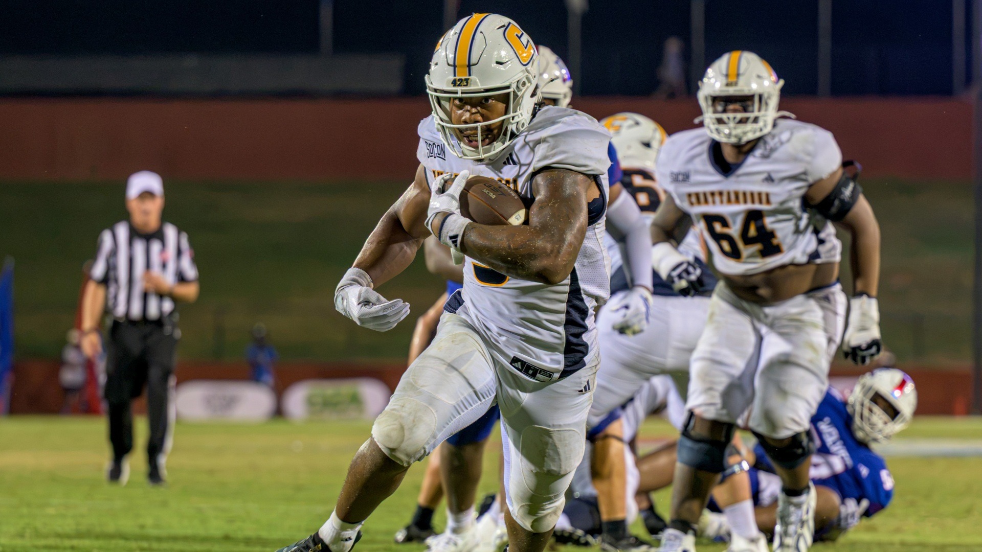 Kevin Lalin drives forward in open field with the ball tucked tight as he approaches the end zone at West Georgia.
