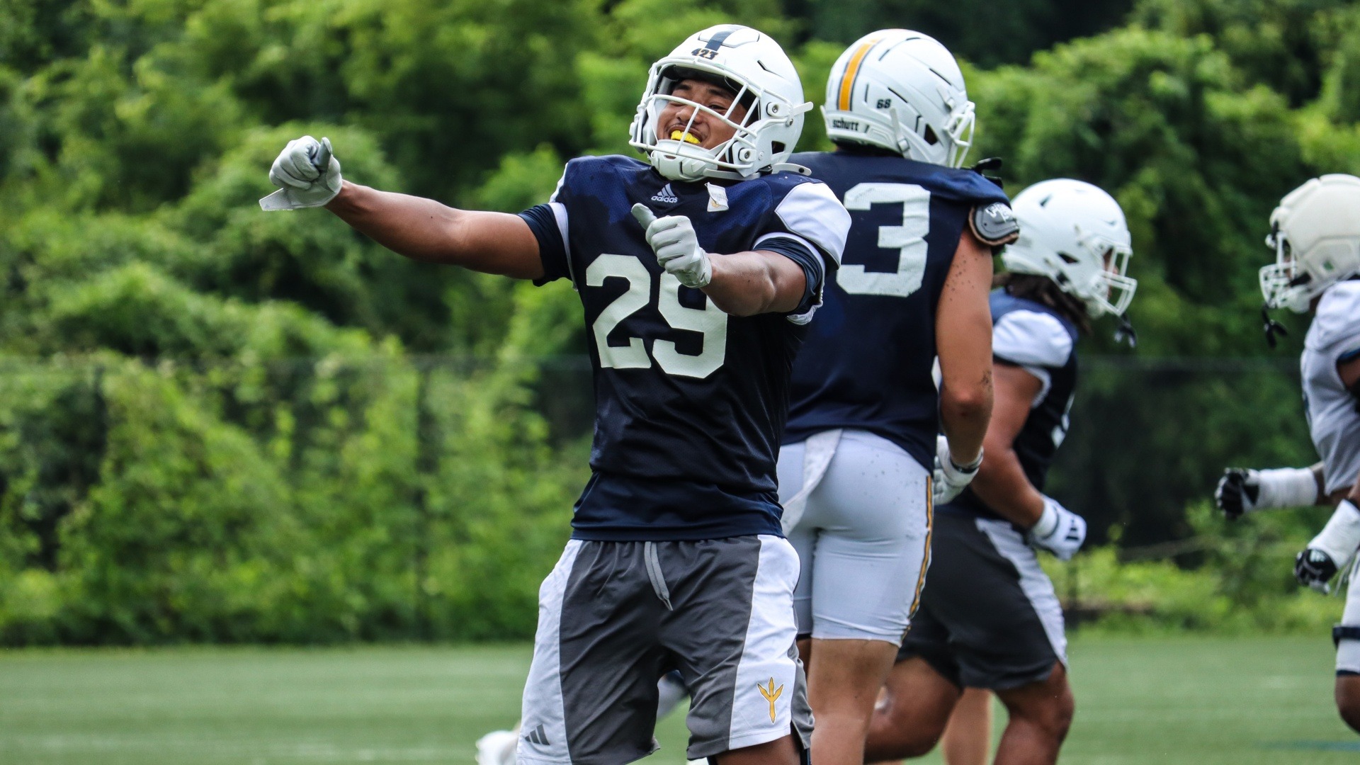 Jaden Nelson celebrates a defensive stop in practice during fall camp 2026